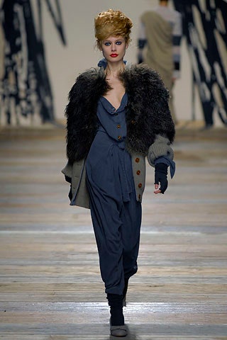 blue relaxed jumpsuit with black fur coat