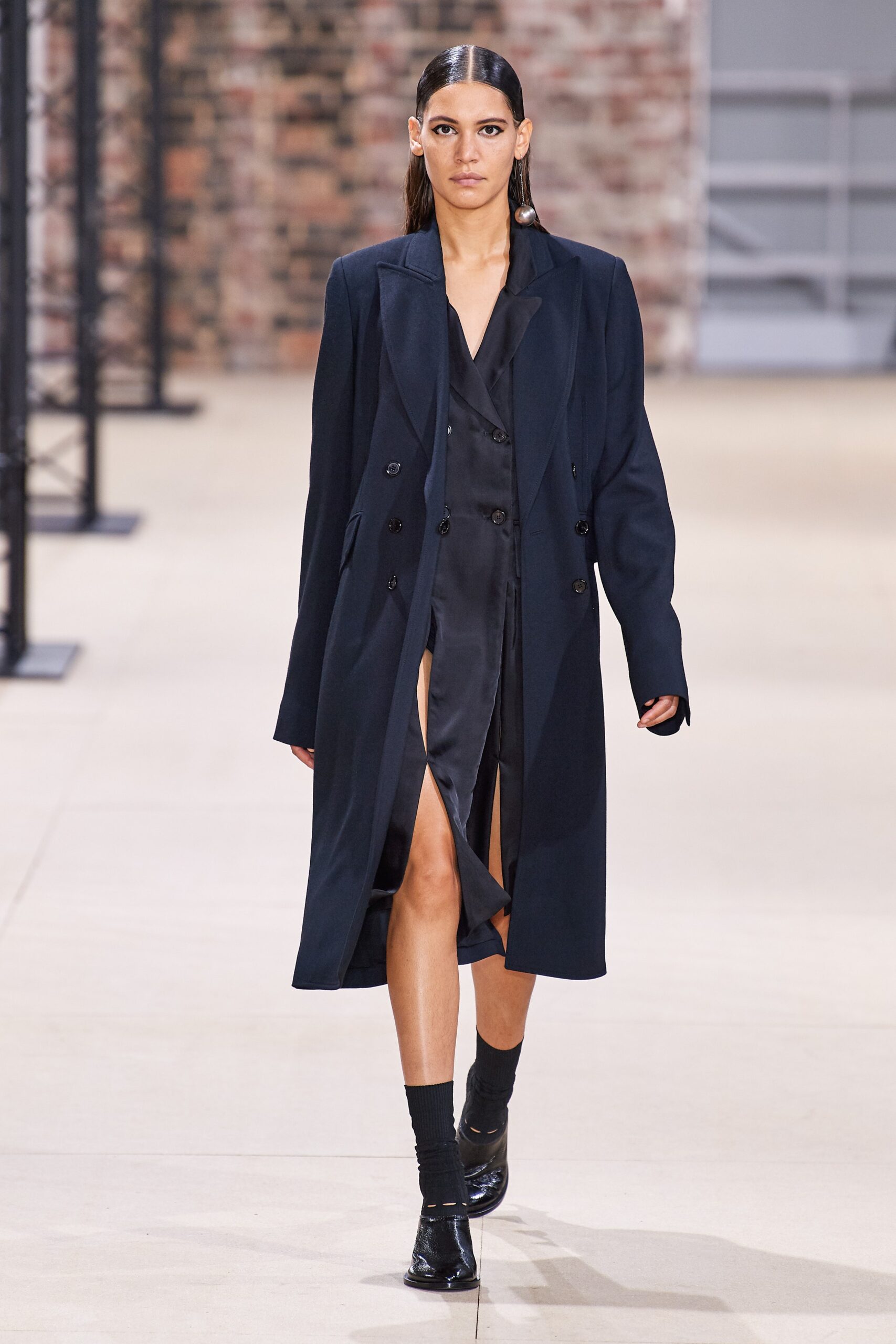 black tailored coat and silk dress