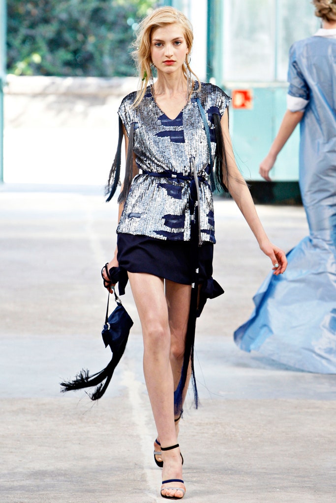 blue sequin top with black skirt
