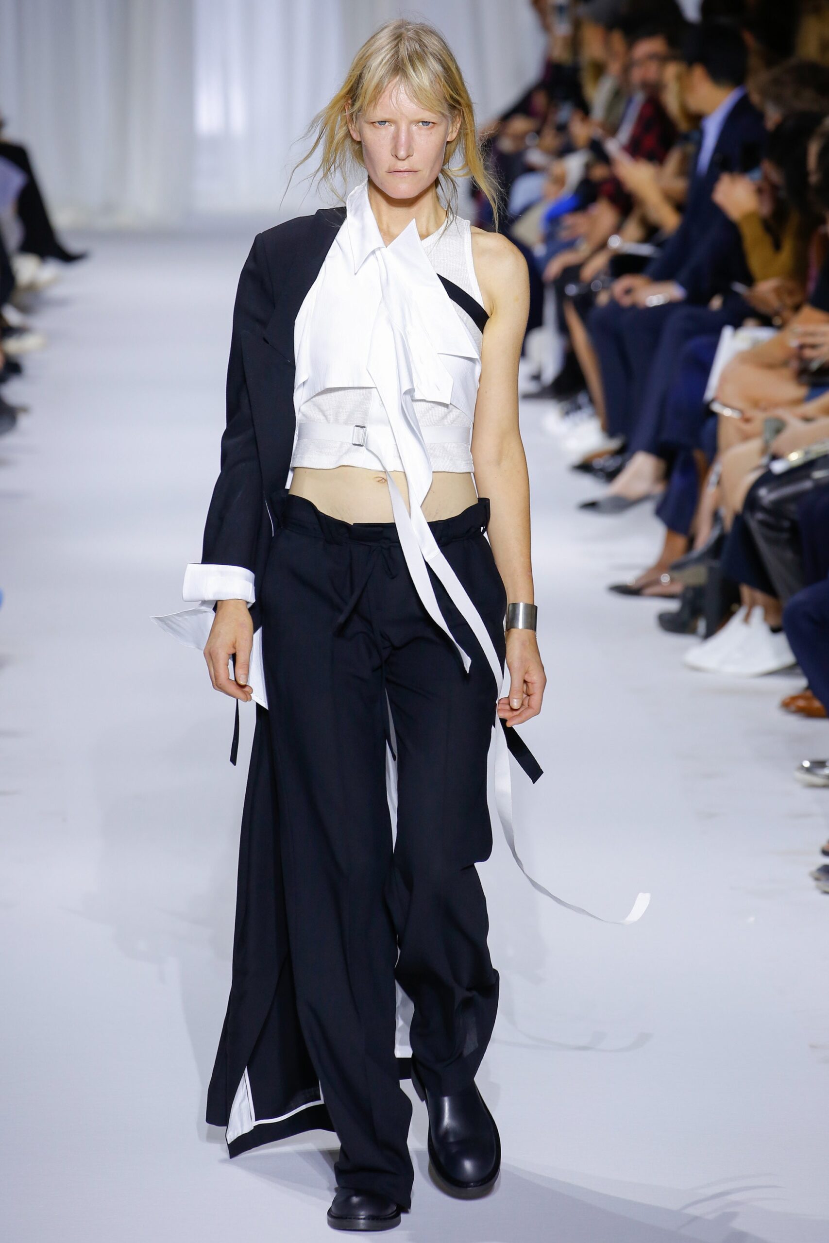 white cotton sleeveless v-neck fitted ruffled blouse
