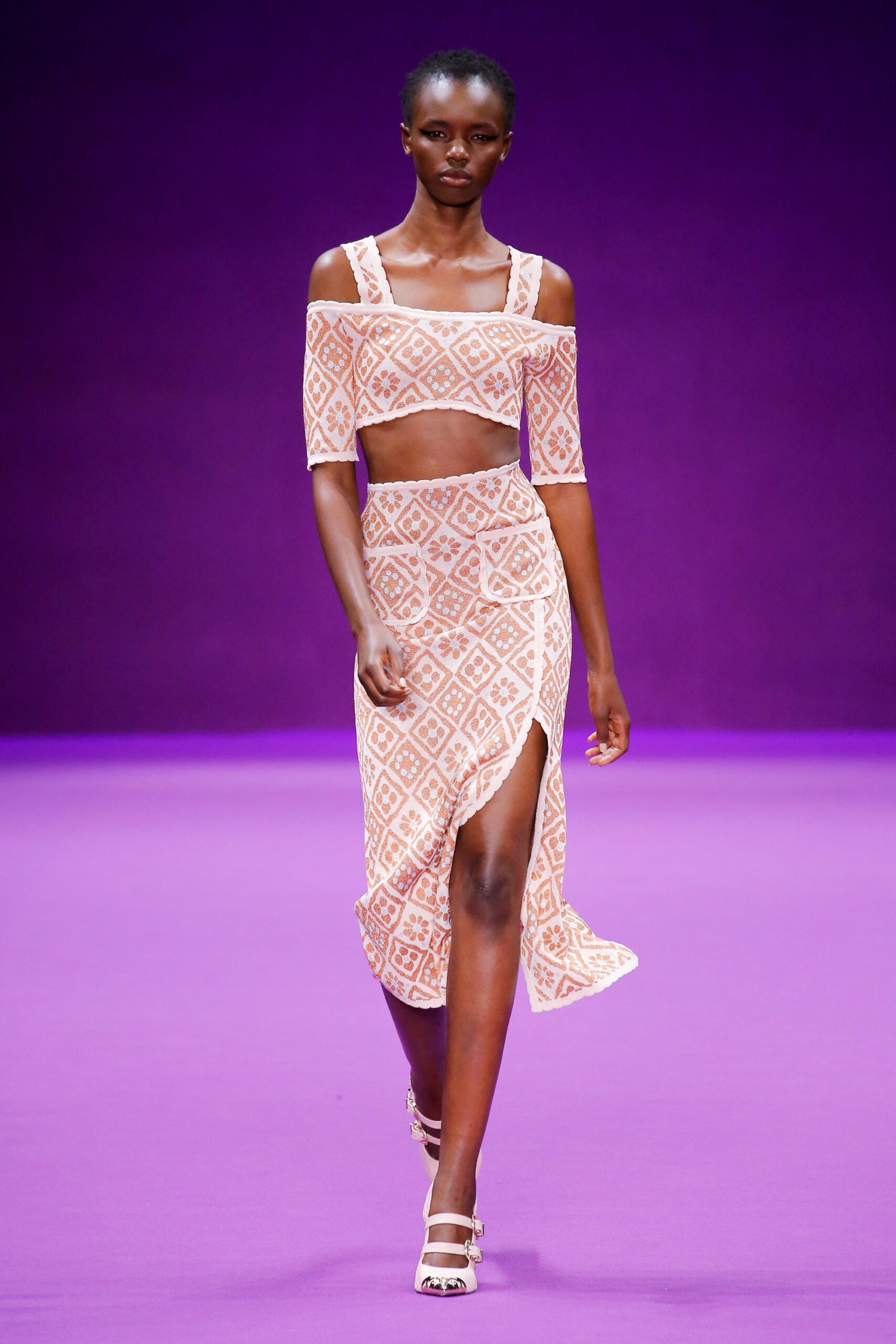 pink embroidered crop-top and midi skirt