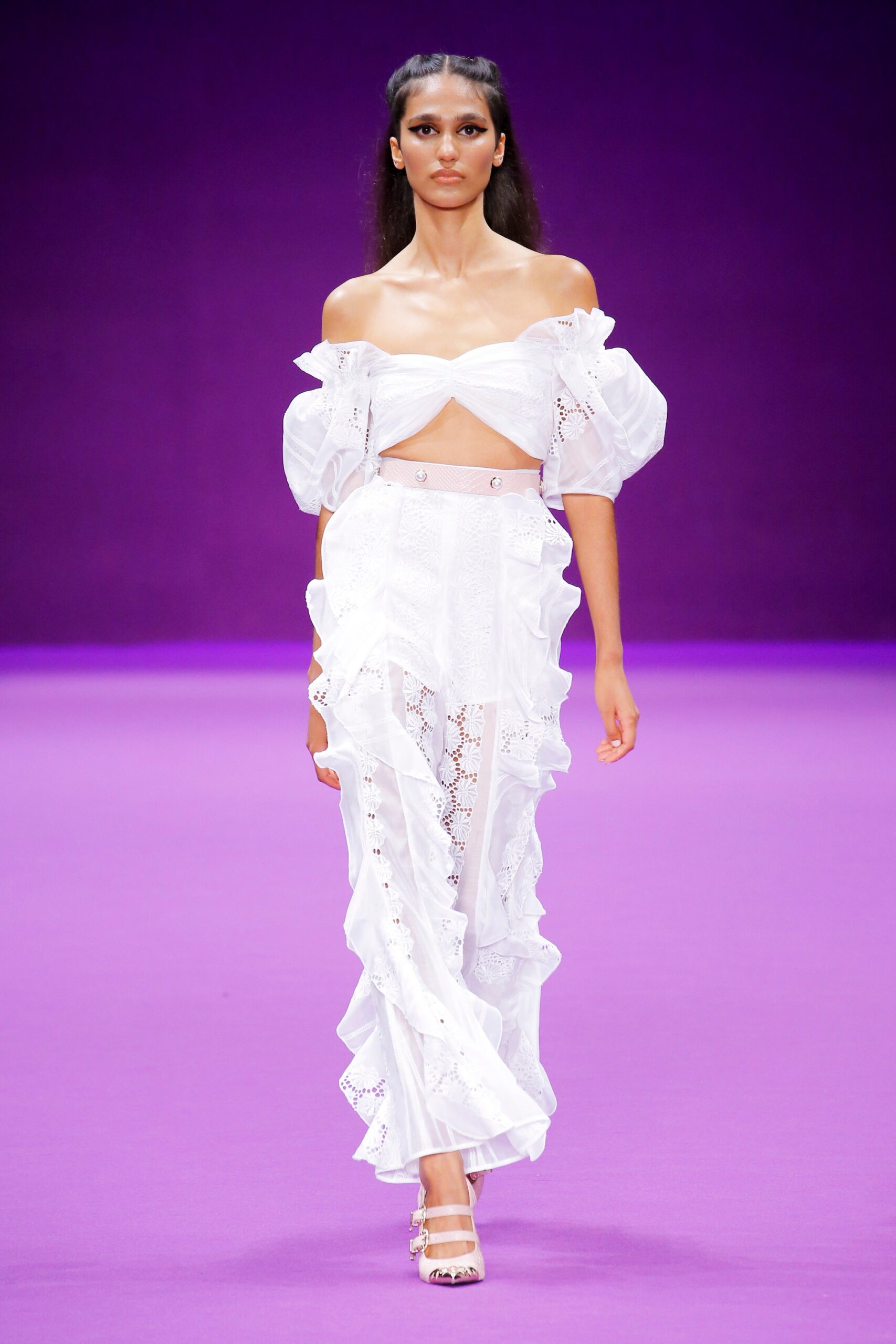 white off-shoulder top and tiered pants