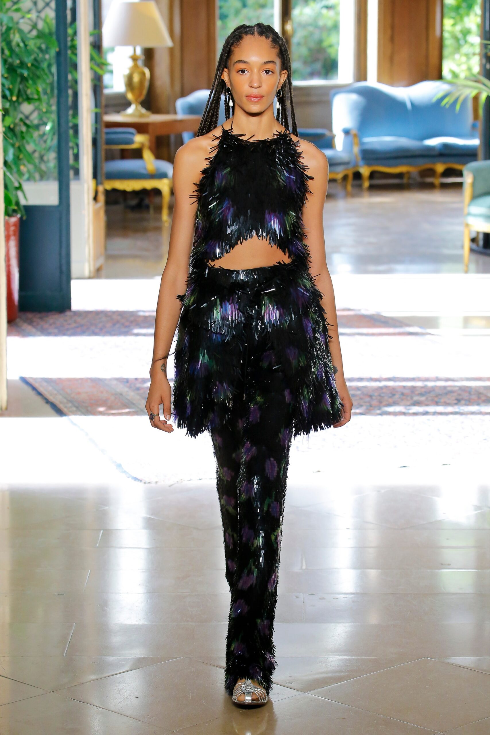 black feather sleeveless high-neck fitted fringed top