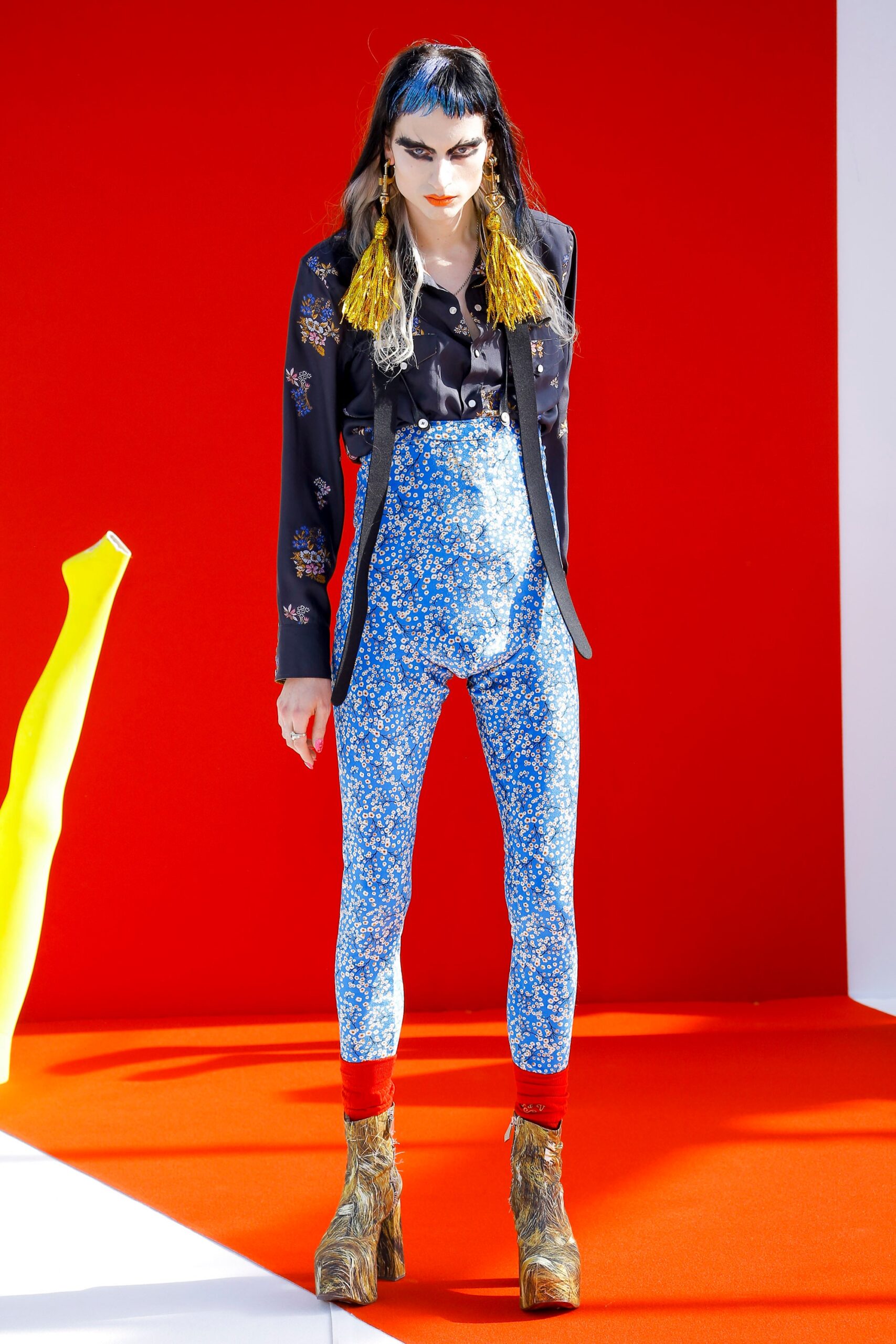 black blazer and blue flared pants