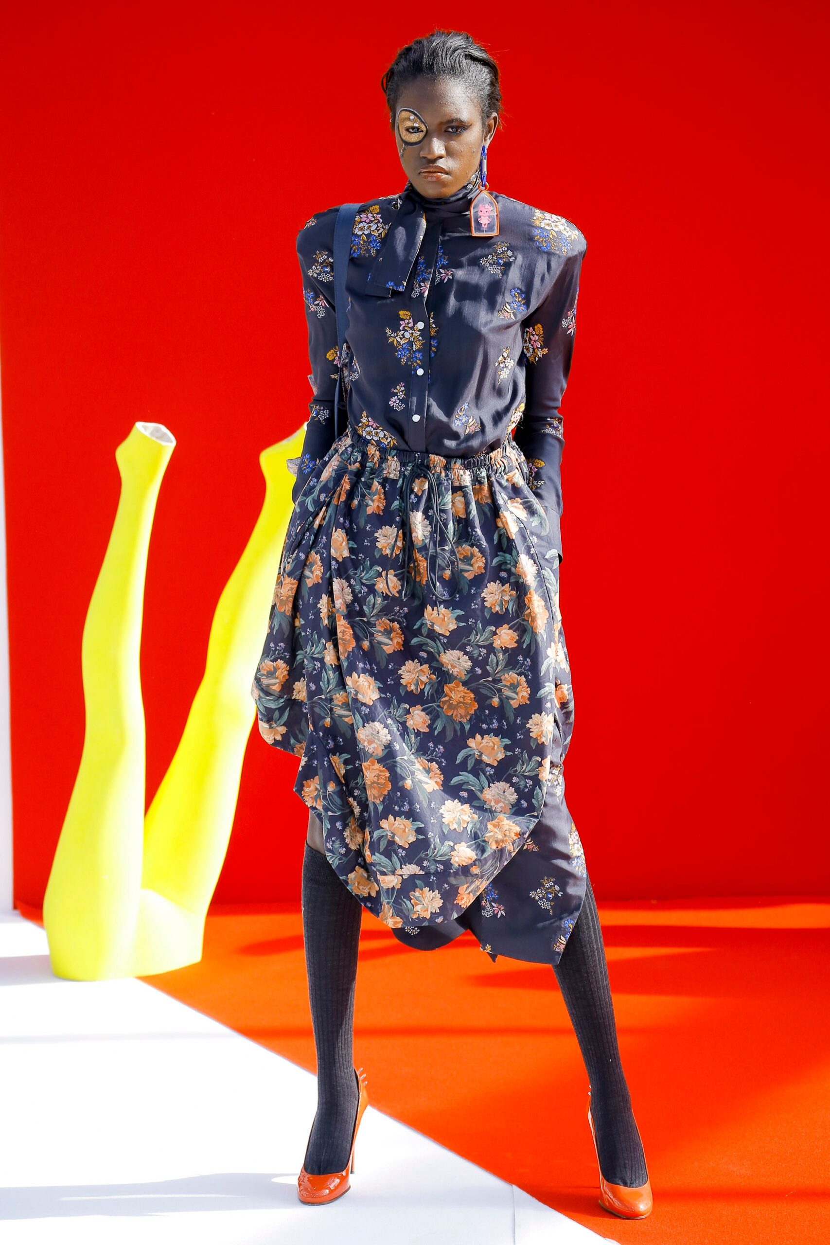 black floral shirt-dress with flared skirt
