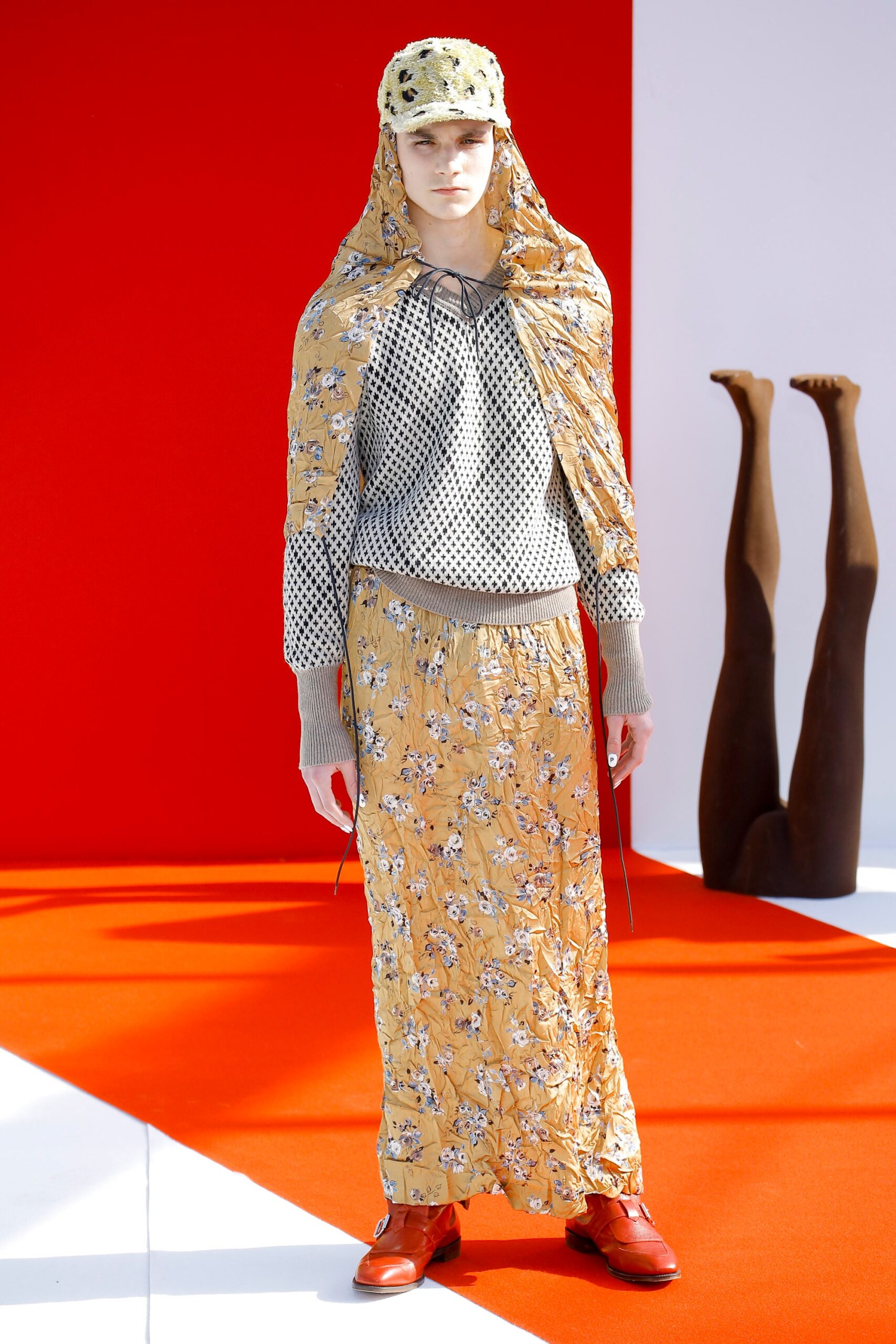 gray polka-dot top with yellow cape
