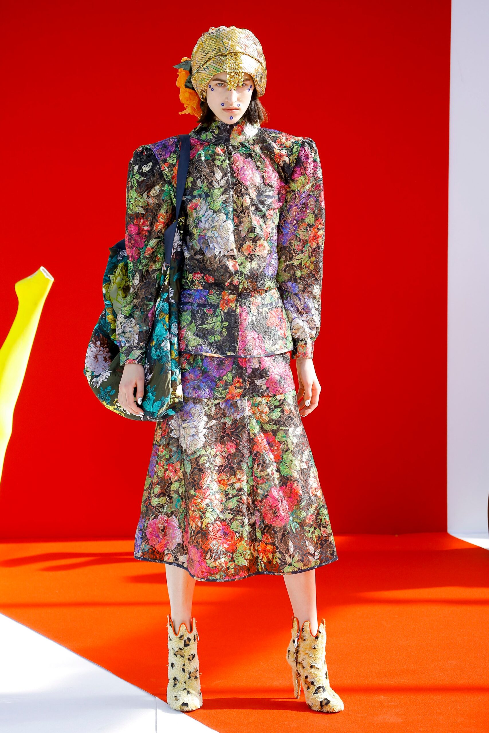 multi-colored floral blouse and skirt