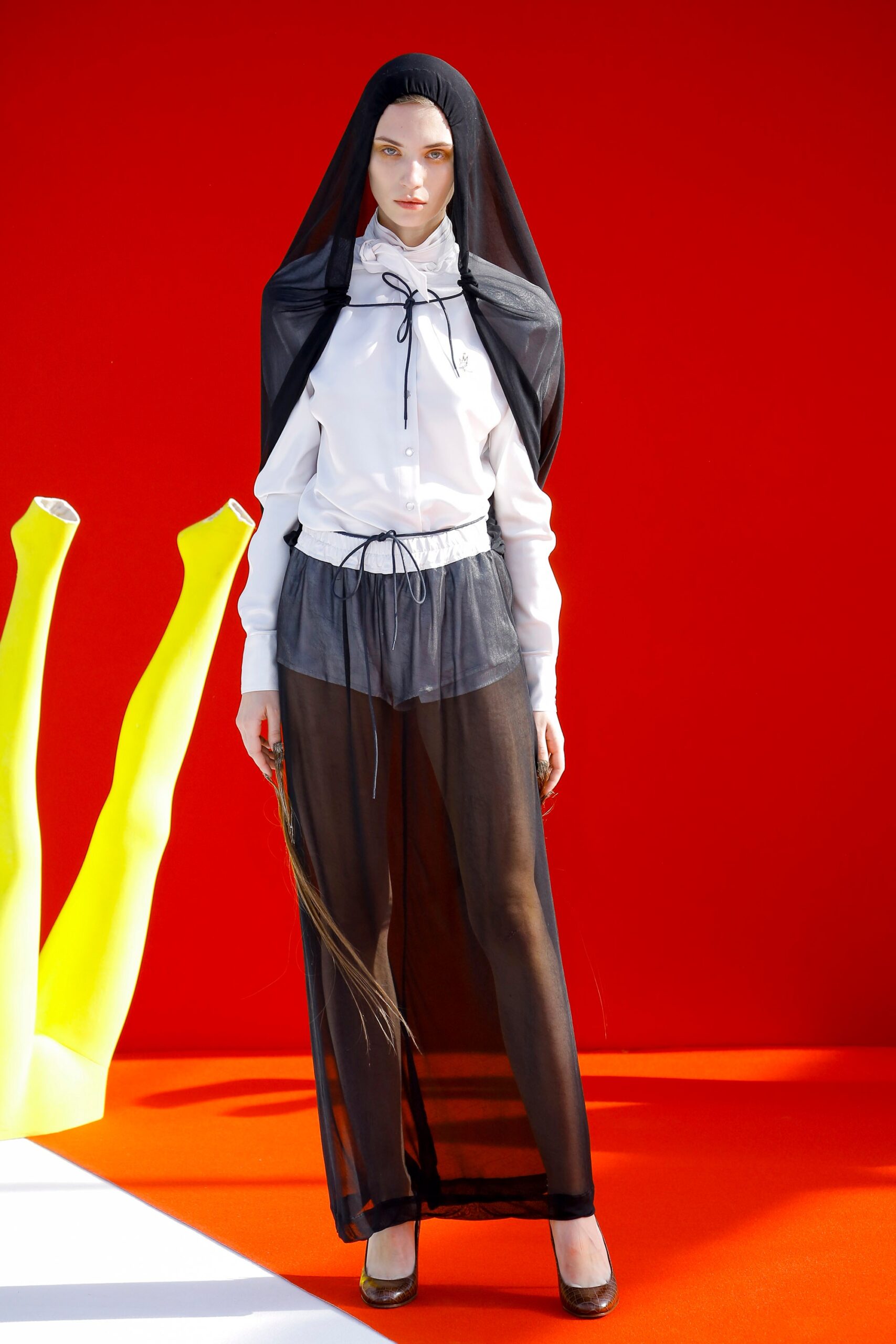white relaxed shirt with sheer pants