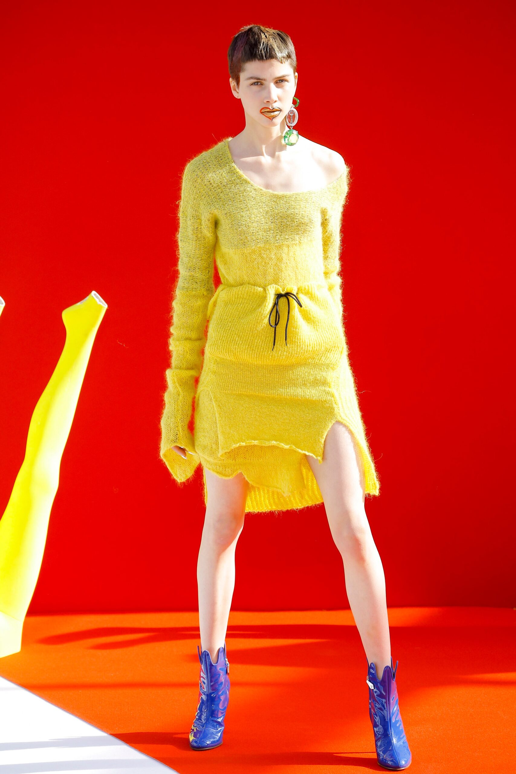 yellow off-shoulder mini dress with blue boots