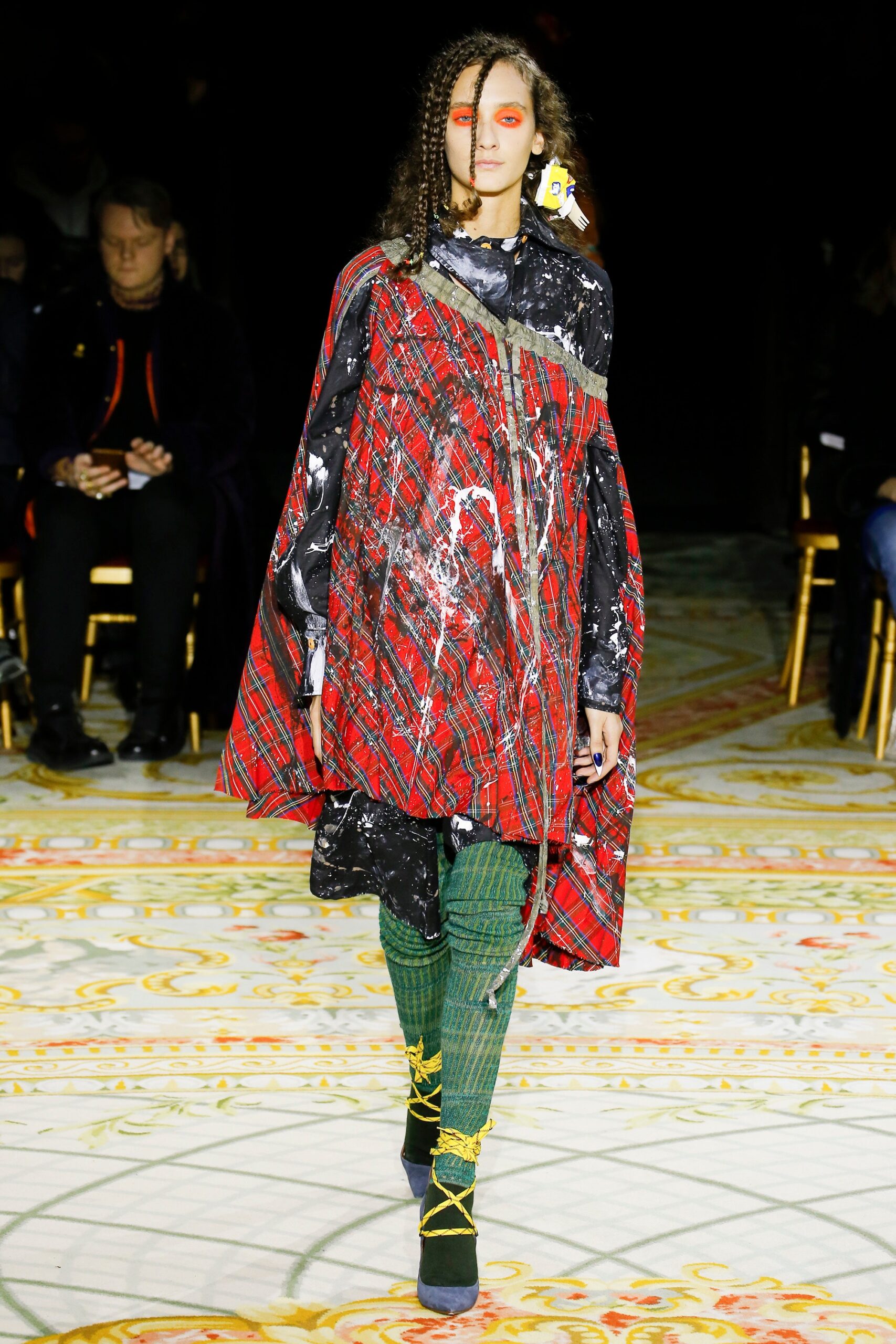 red and black printed cape