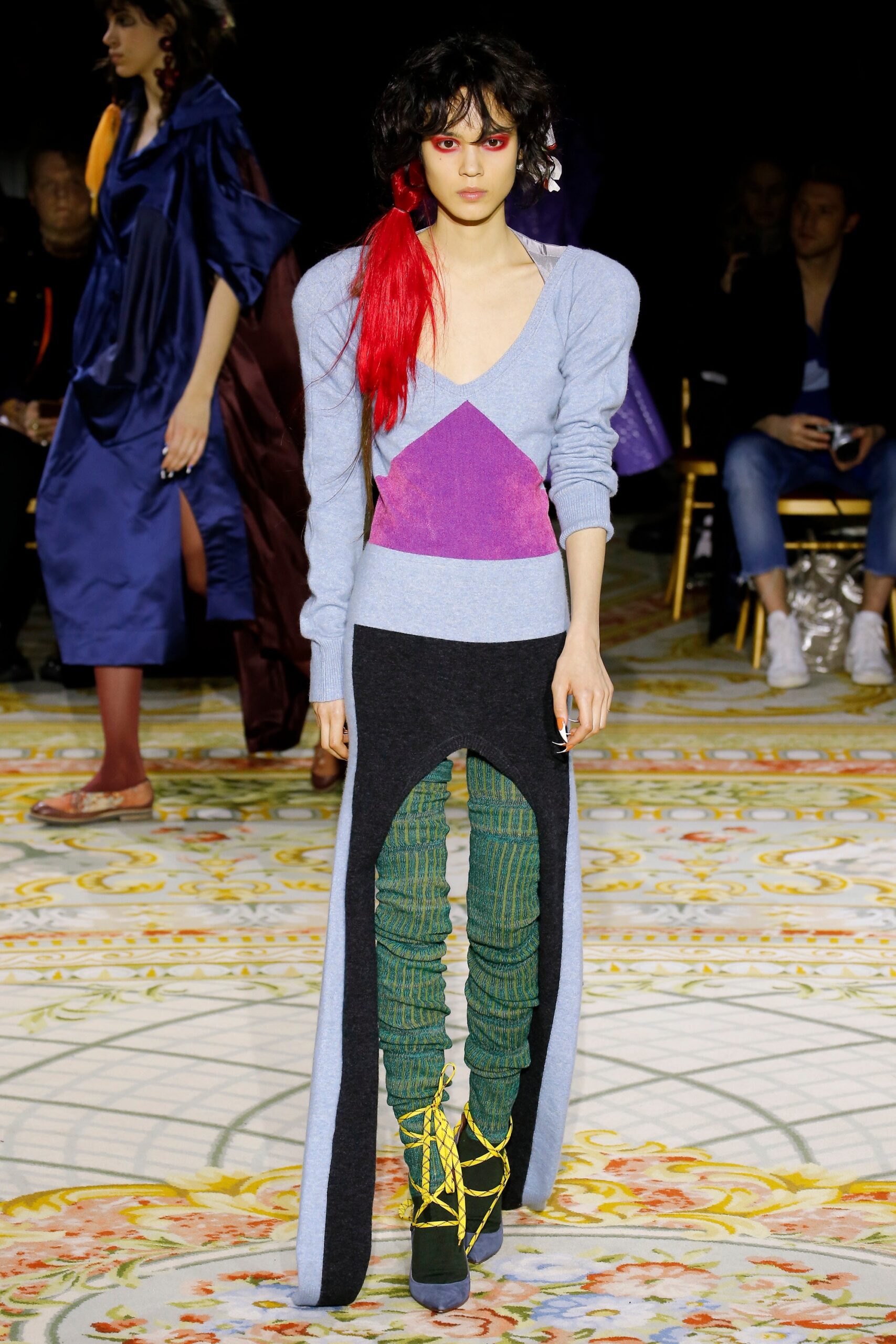 gray and purple fitted top with green pants