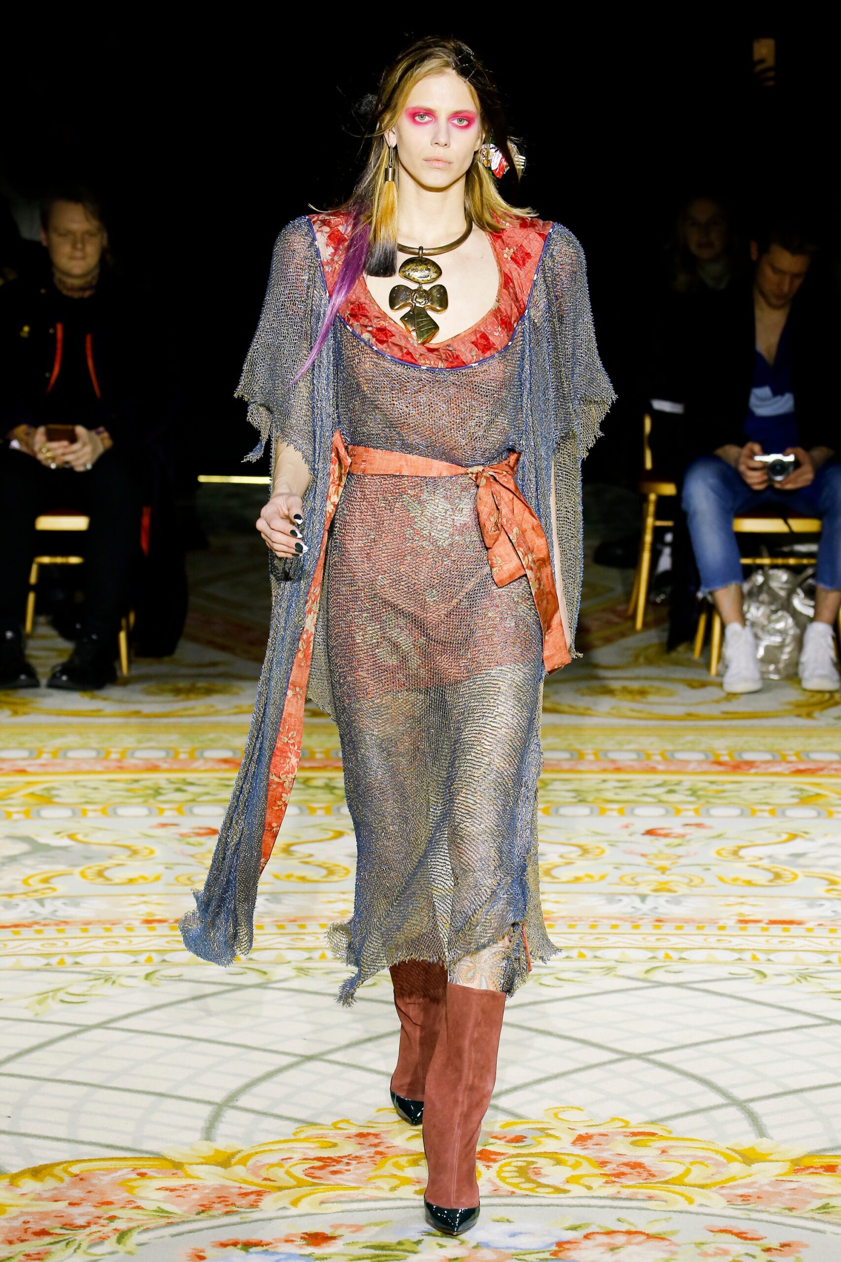 blue mesh layered dress with red boots