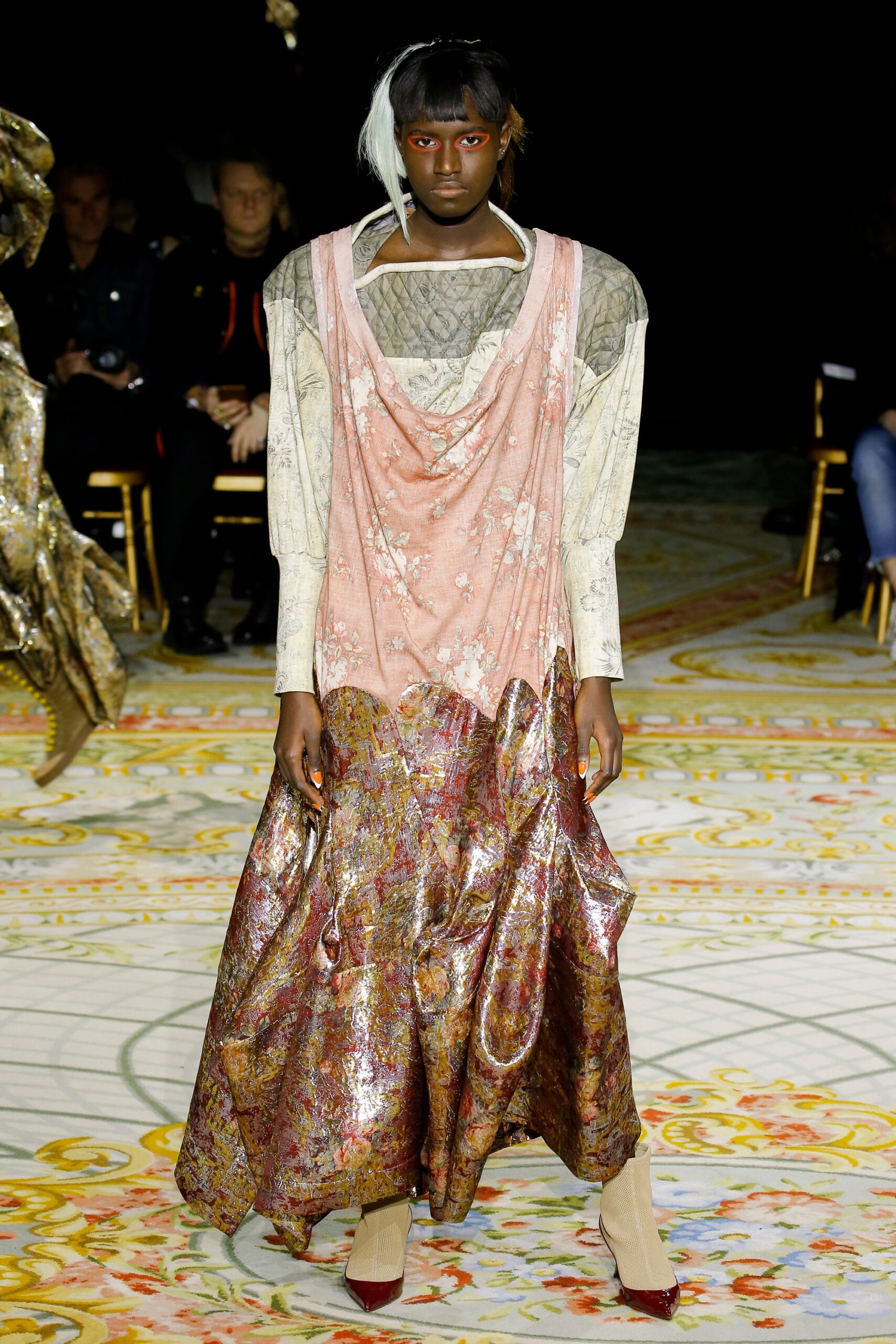 pink and gold flowing dress