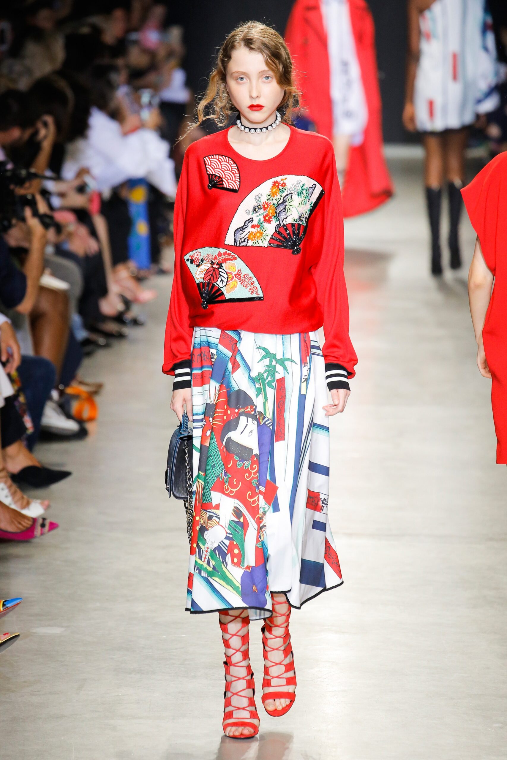 red relaxed top with printed midi skirt