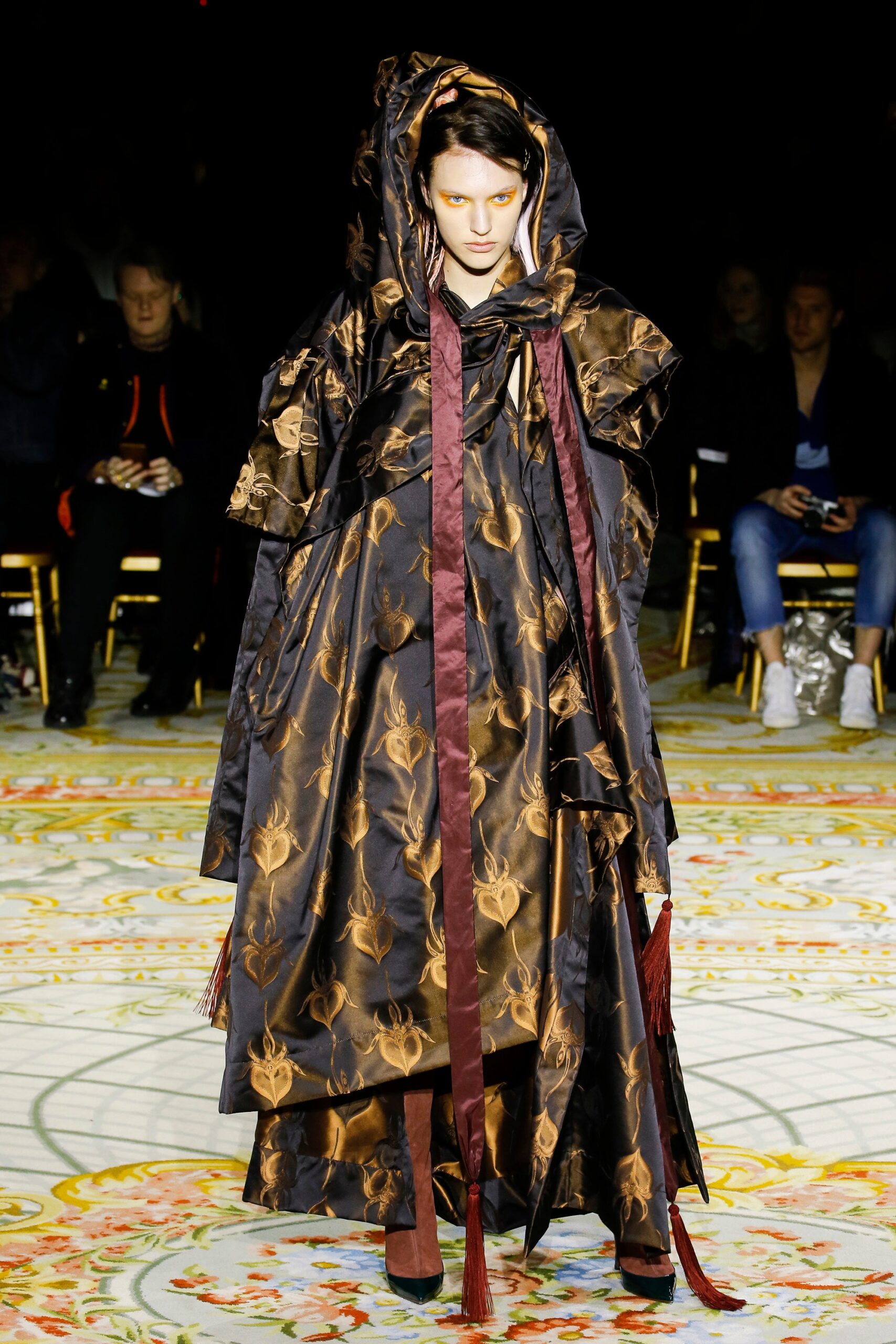 black silk layered dress and cape
