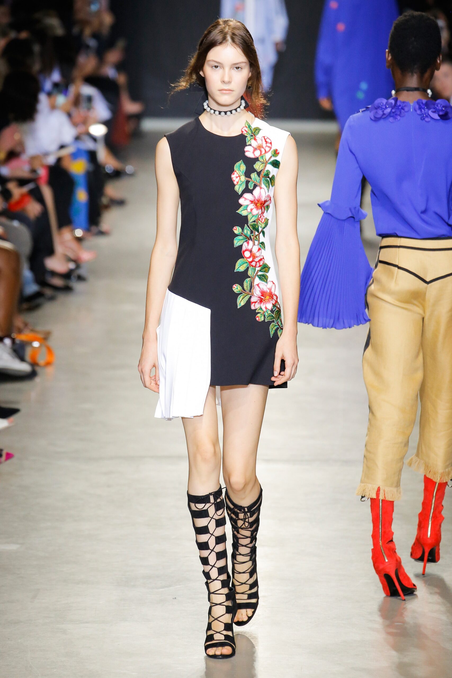 black cotton sleeveless high-neck fitted floral mini dress