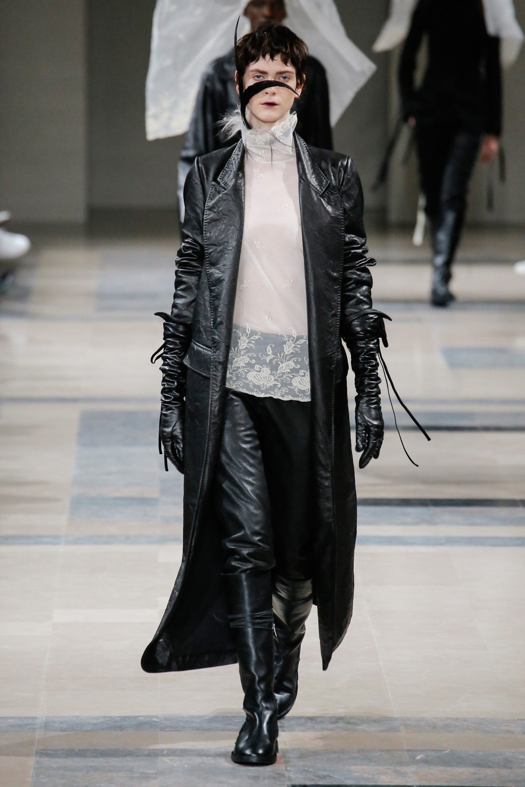 black leather coat with white top