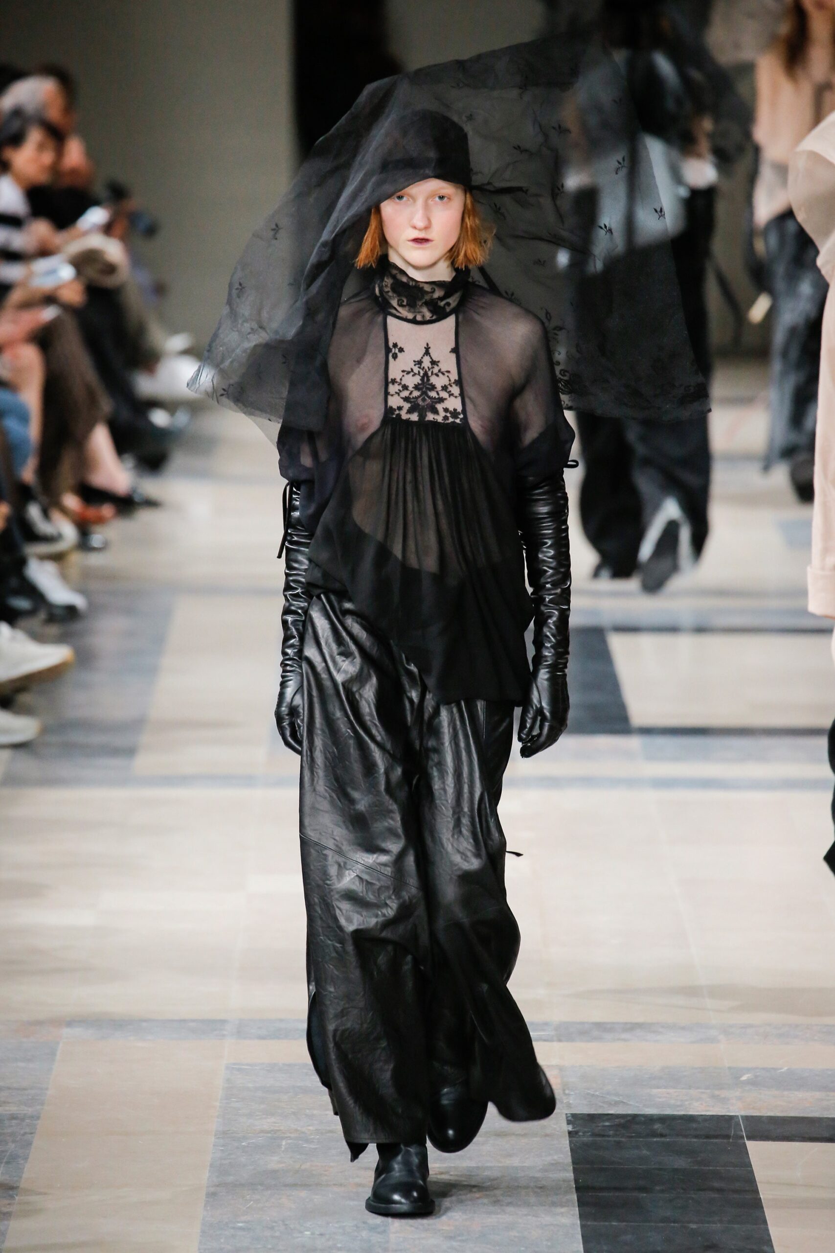 black silk top with leather pants