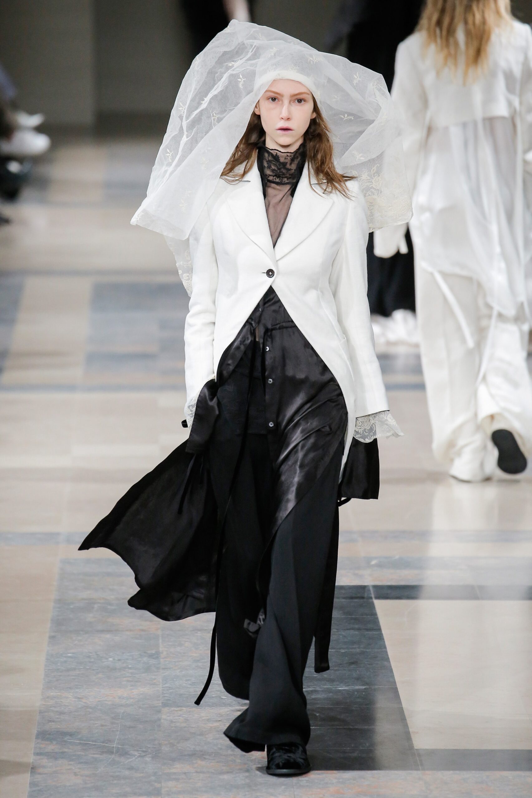 white blazer black silk top and pants