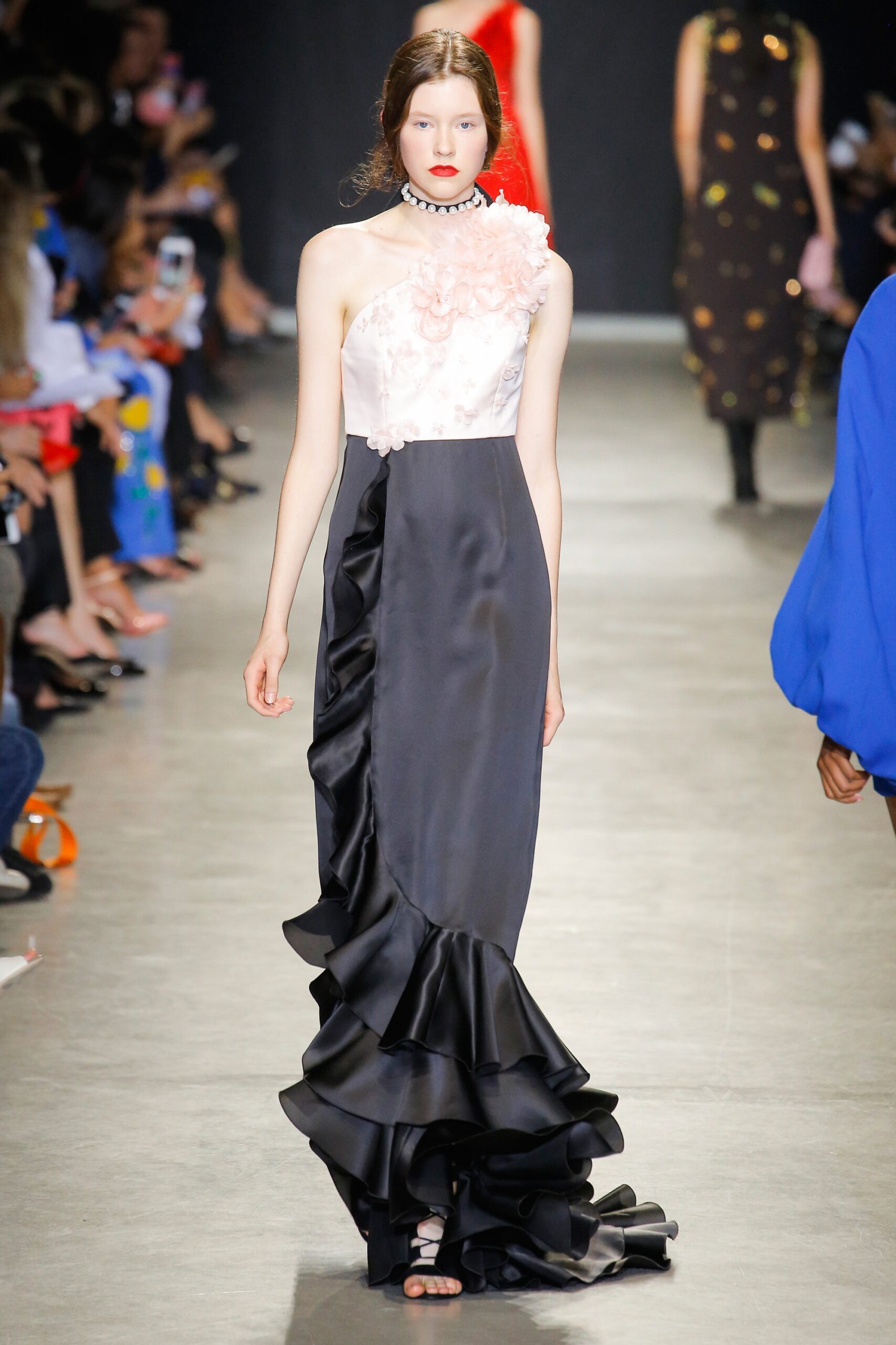 black and pink ruffled gown