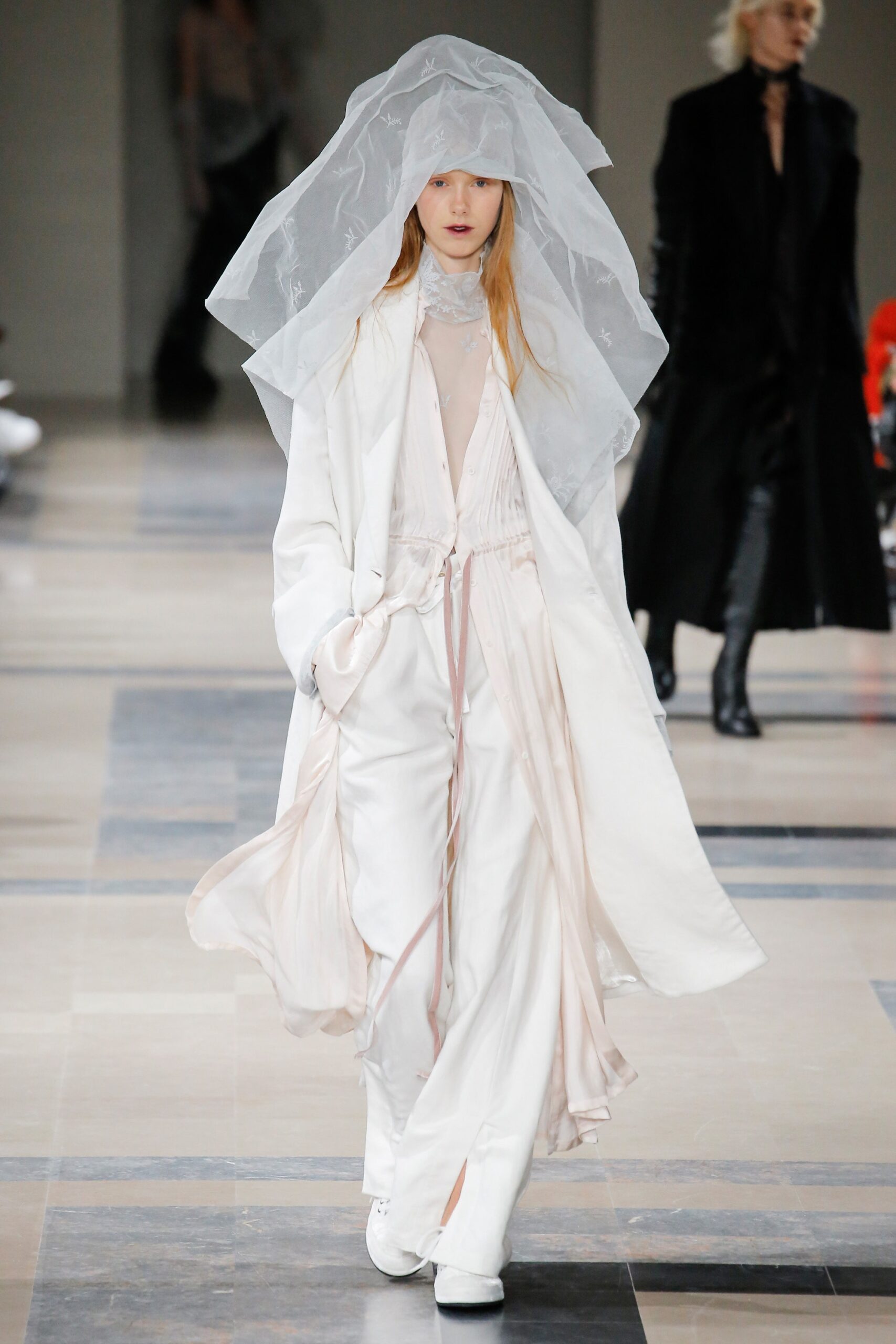 white silk relaxed coat and jumpsuit