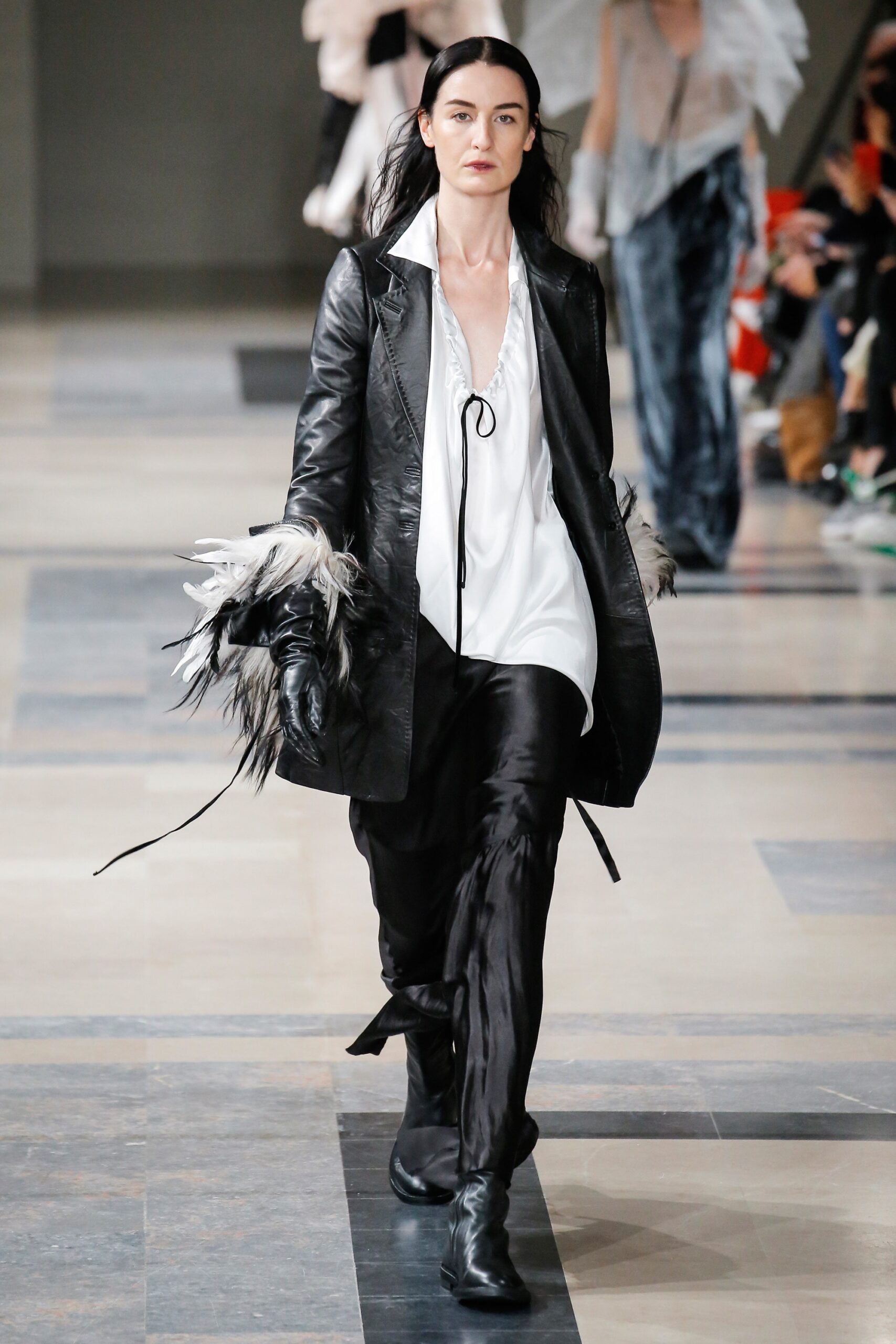 black leather coat with white blouse