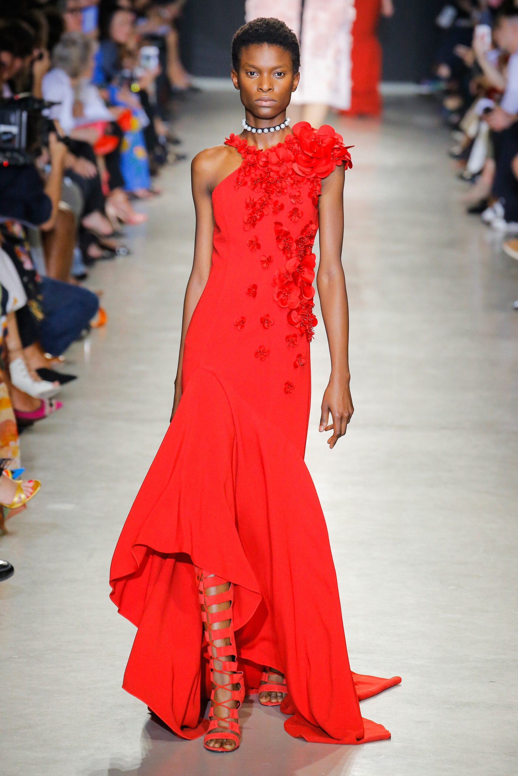 red silk sleeveless high-neck fitted draped embellished gown