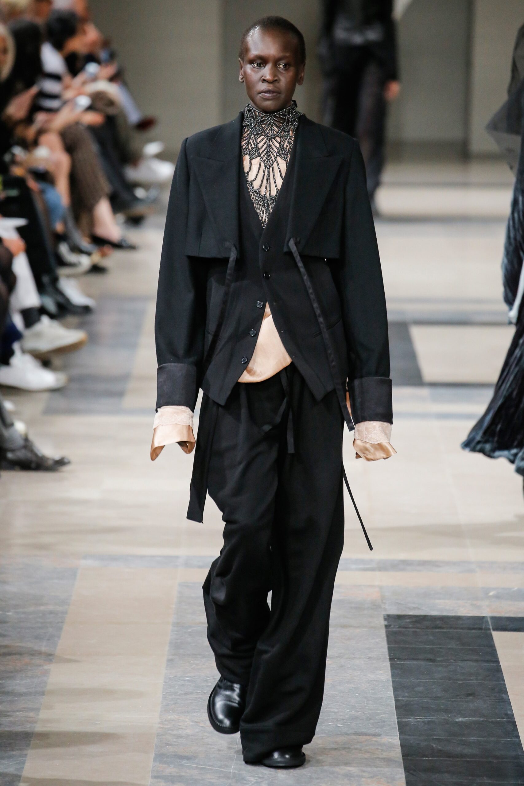 black layered jacket and vest