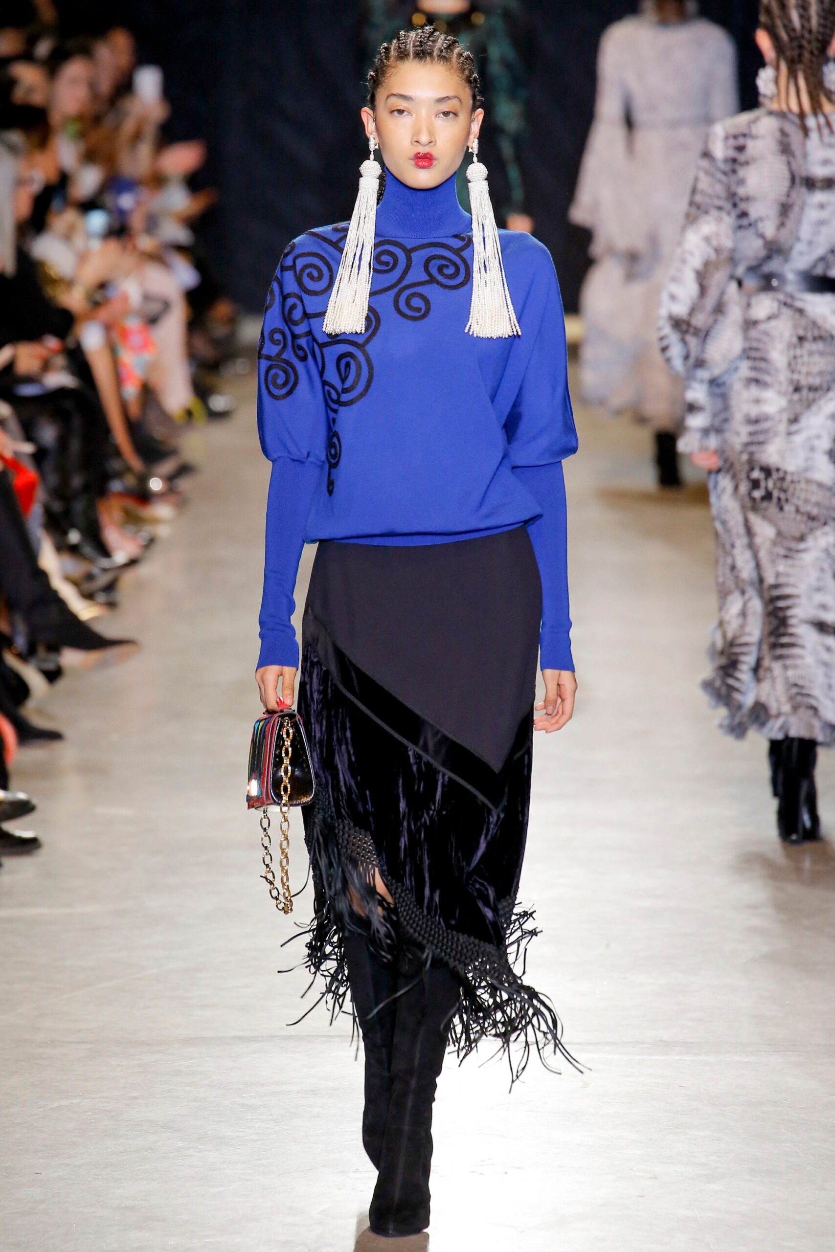 blue fitted top with black asymmetric skirt
