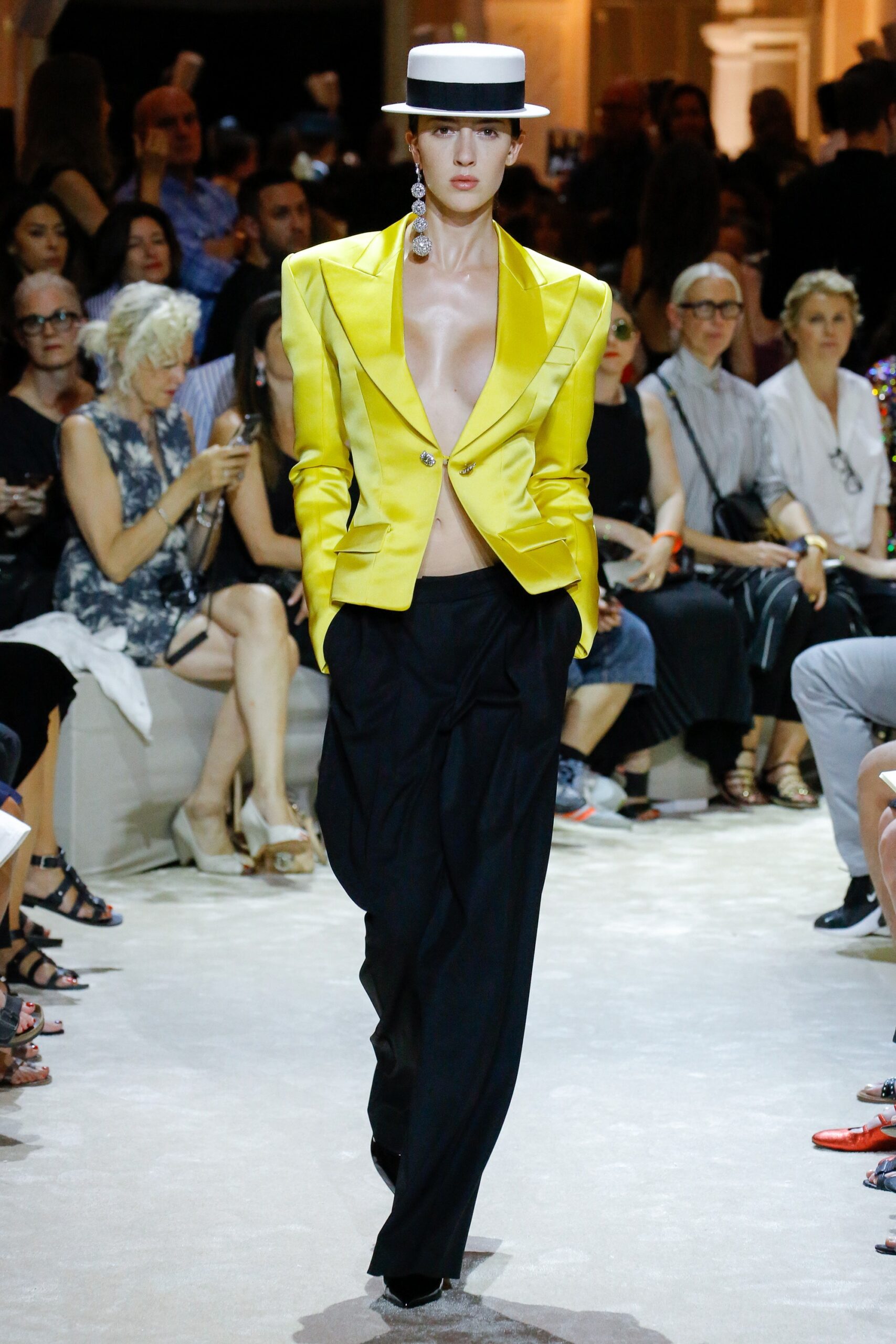 yellow fitted blazer with black pants