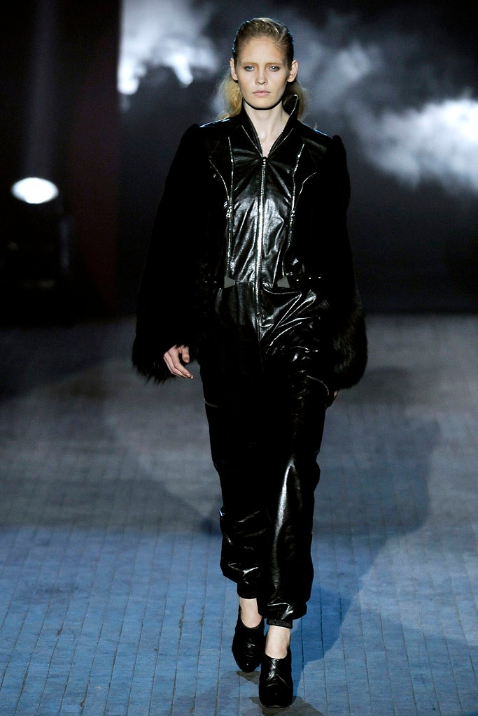 black leather jumpsuit with faux-fur coat