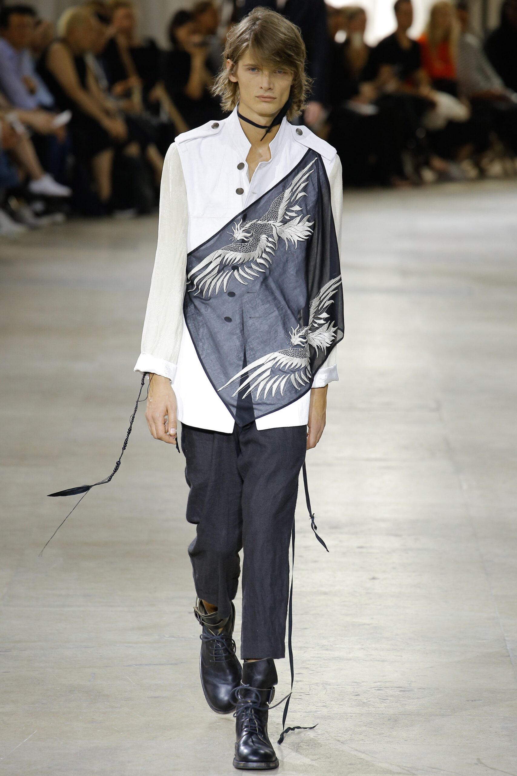 white and blue embroidered shirt with black pants