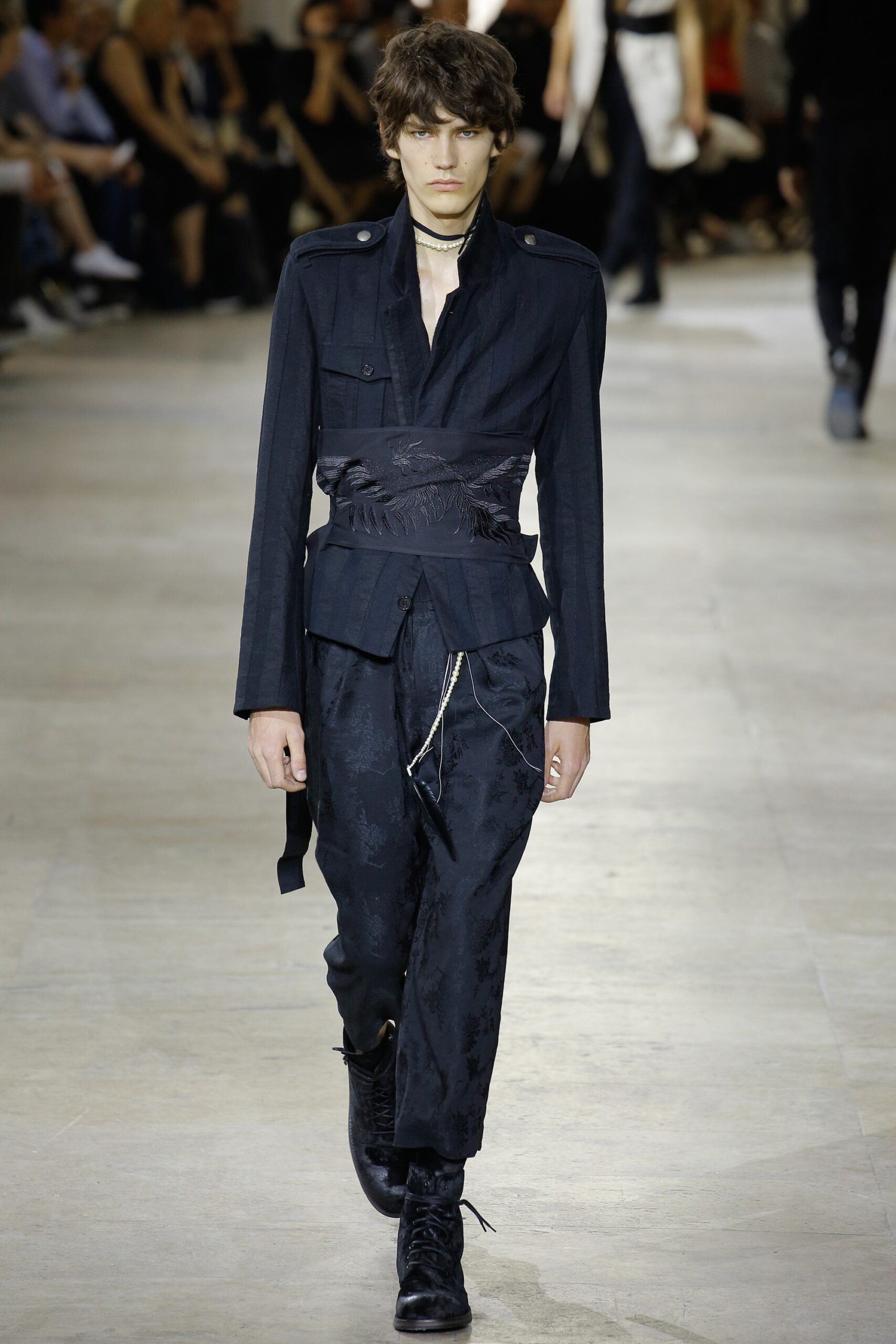 black tailored jacket and relaxed pants