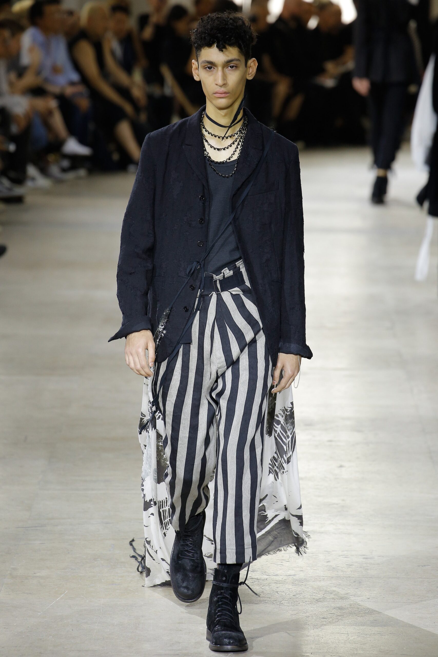 black relaxed jacket with striped pants