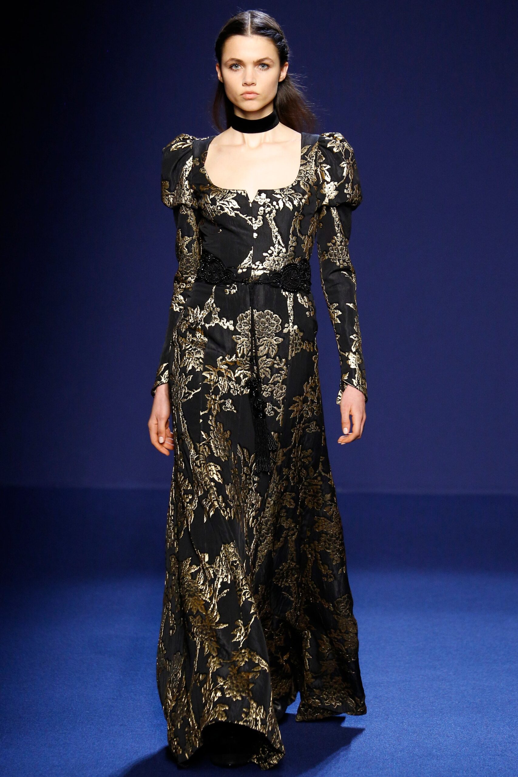 black and gold embroidered gown