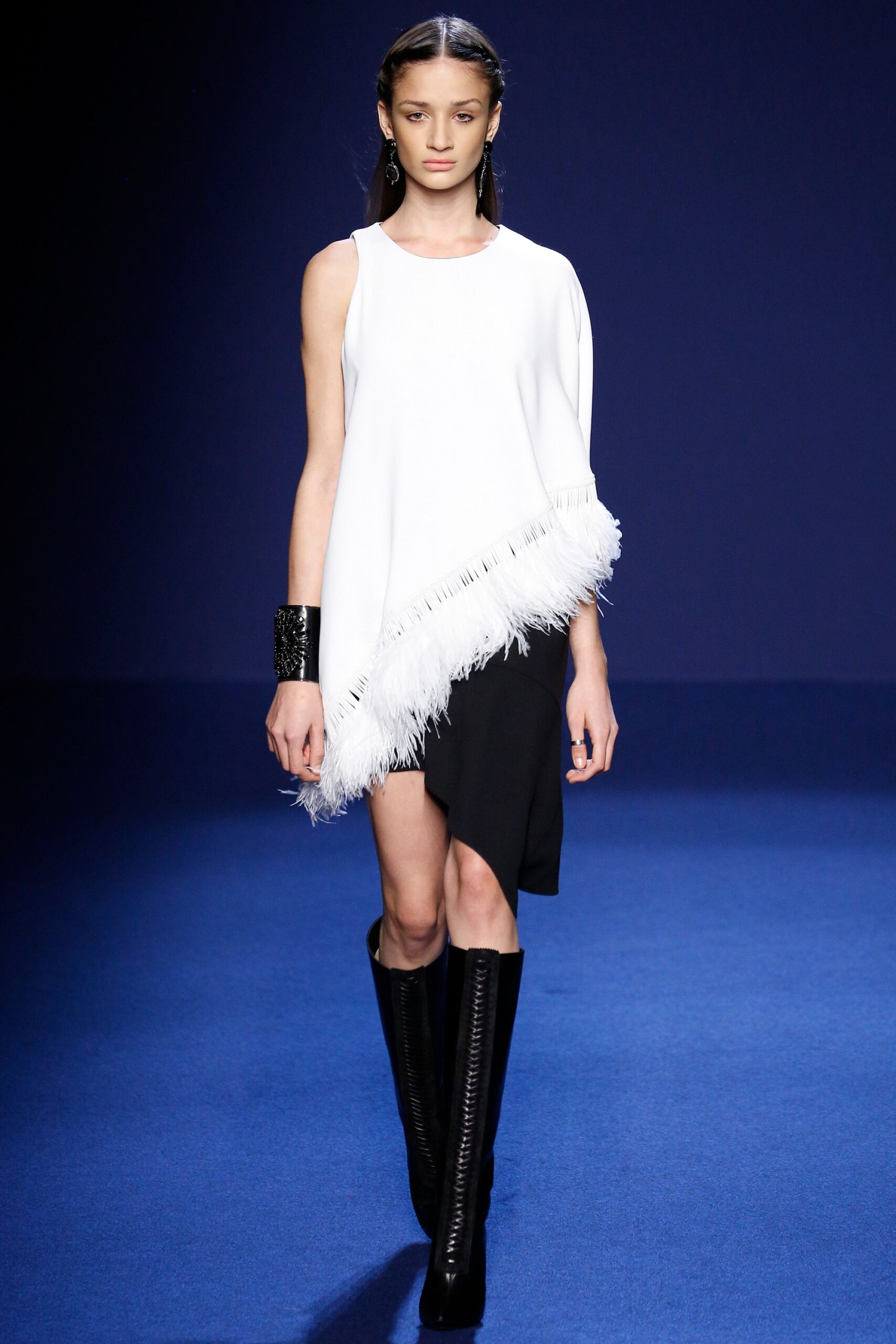 white asymmetric top with fringes