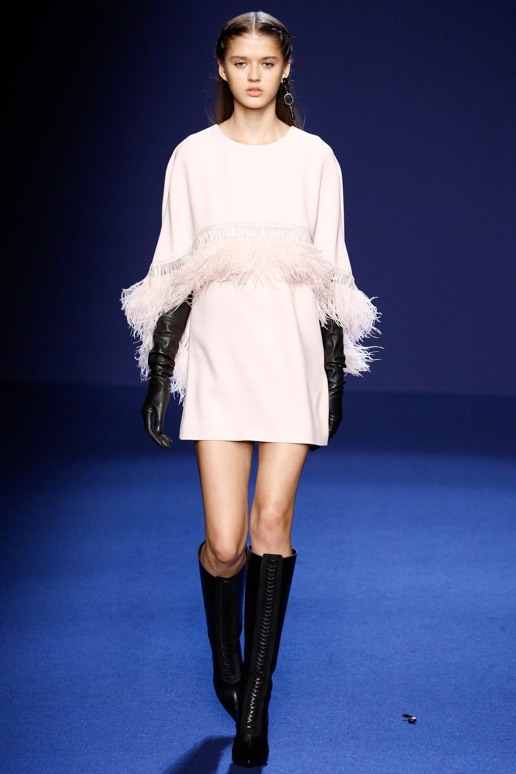 pink fringed mini dress with boots