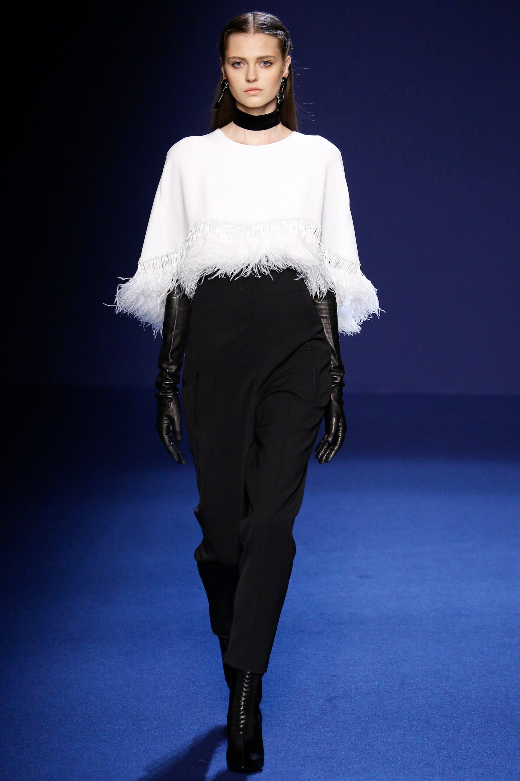 white fringed top with black pants