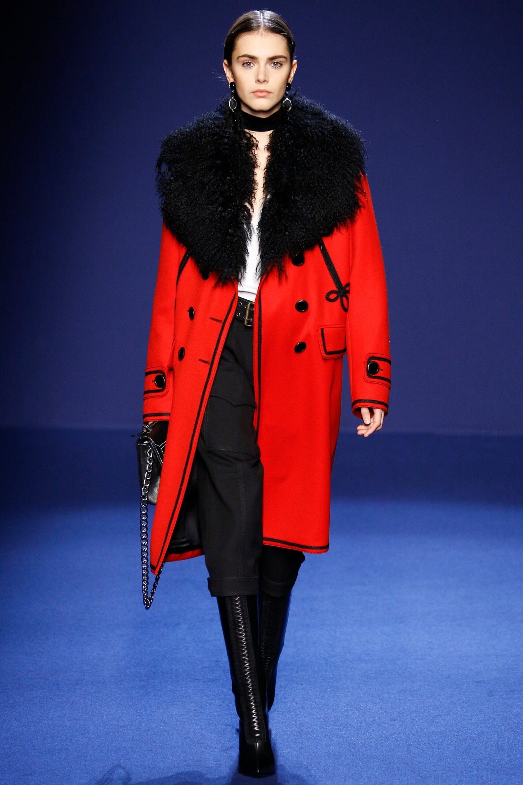 red wool coat with black pants