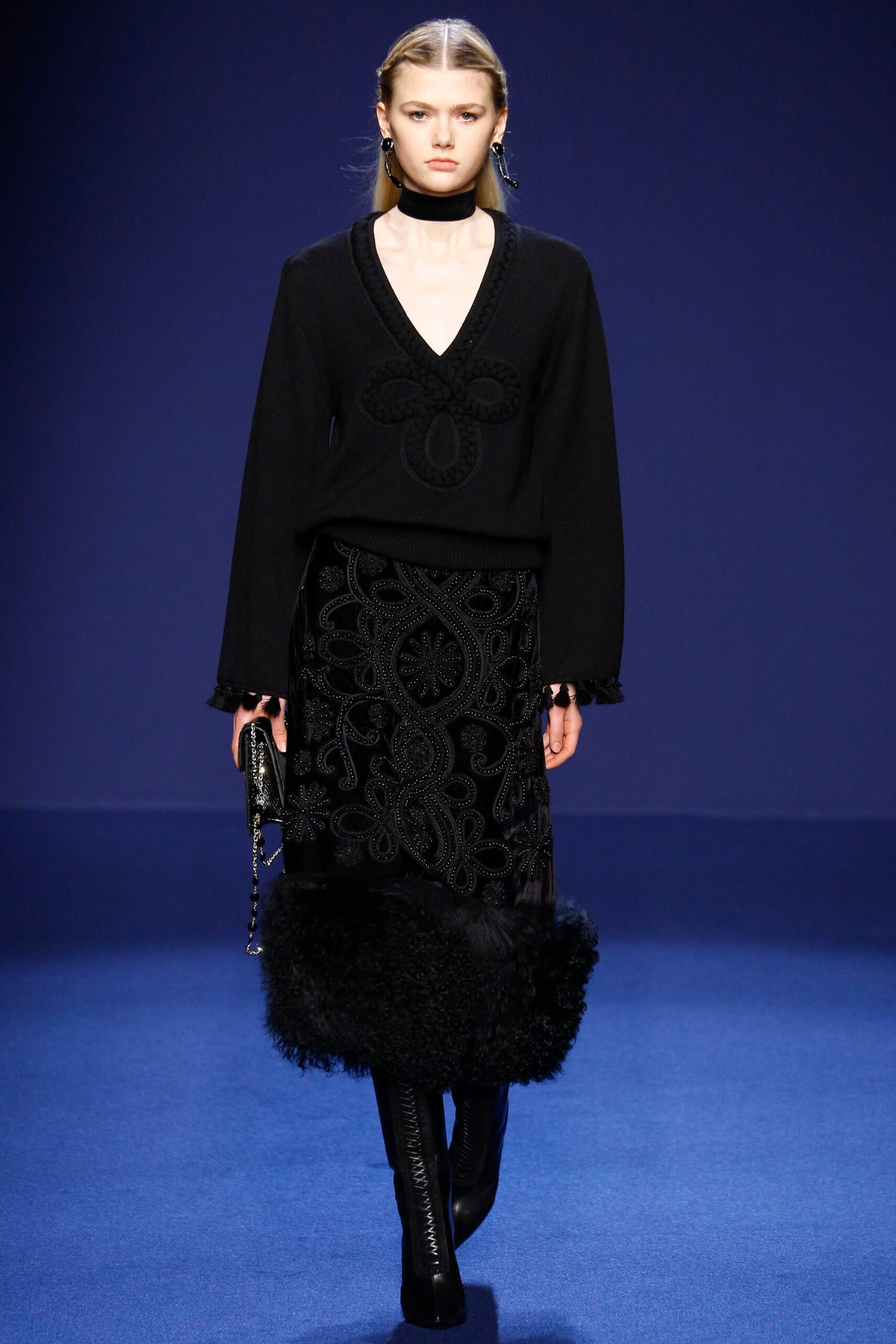 black embroidered top and skirt