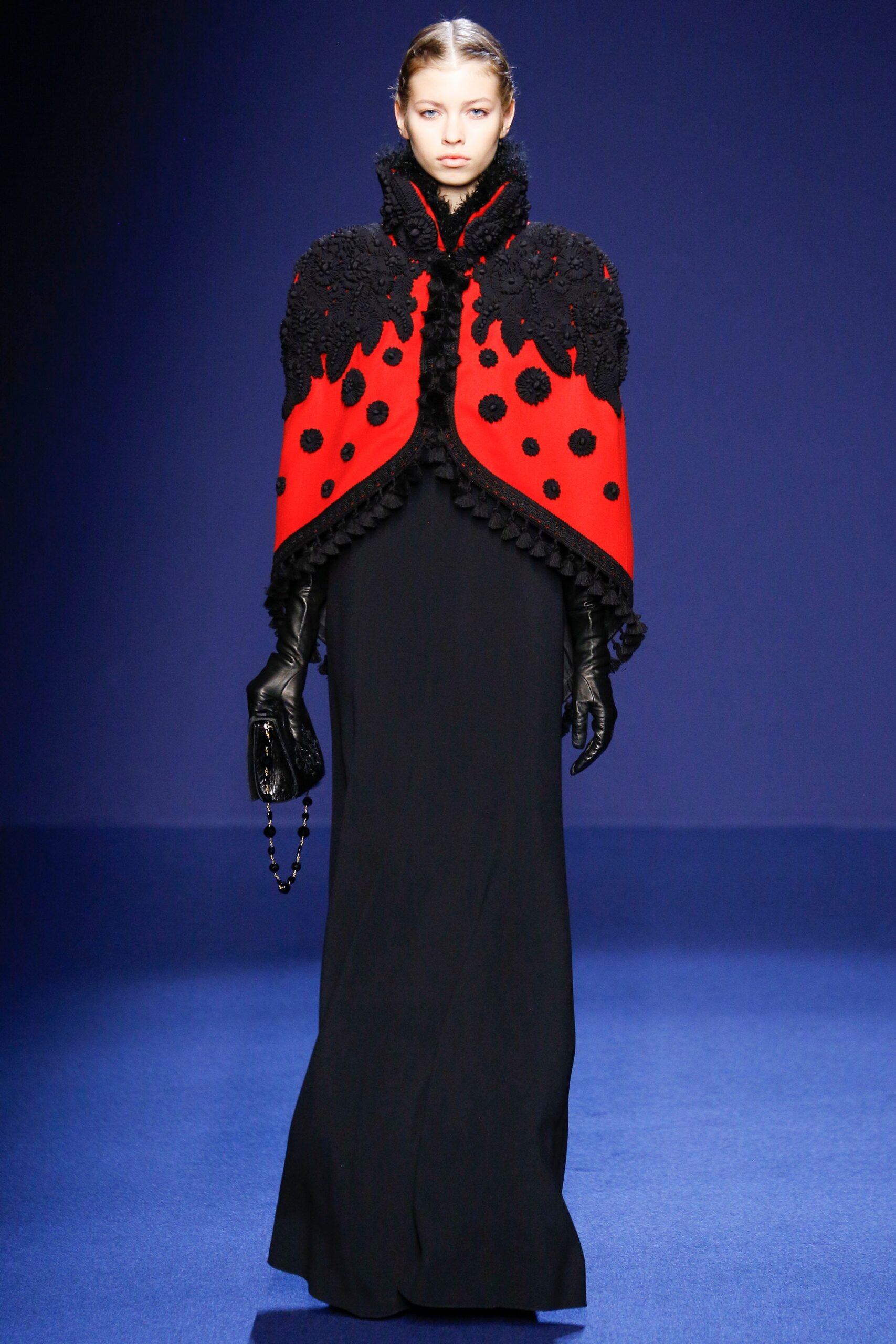red and black embroidered cape with gown