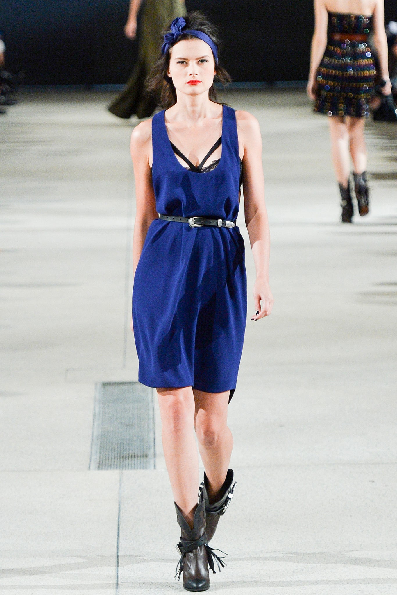 blue fitted sleeveless dress with boots