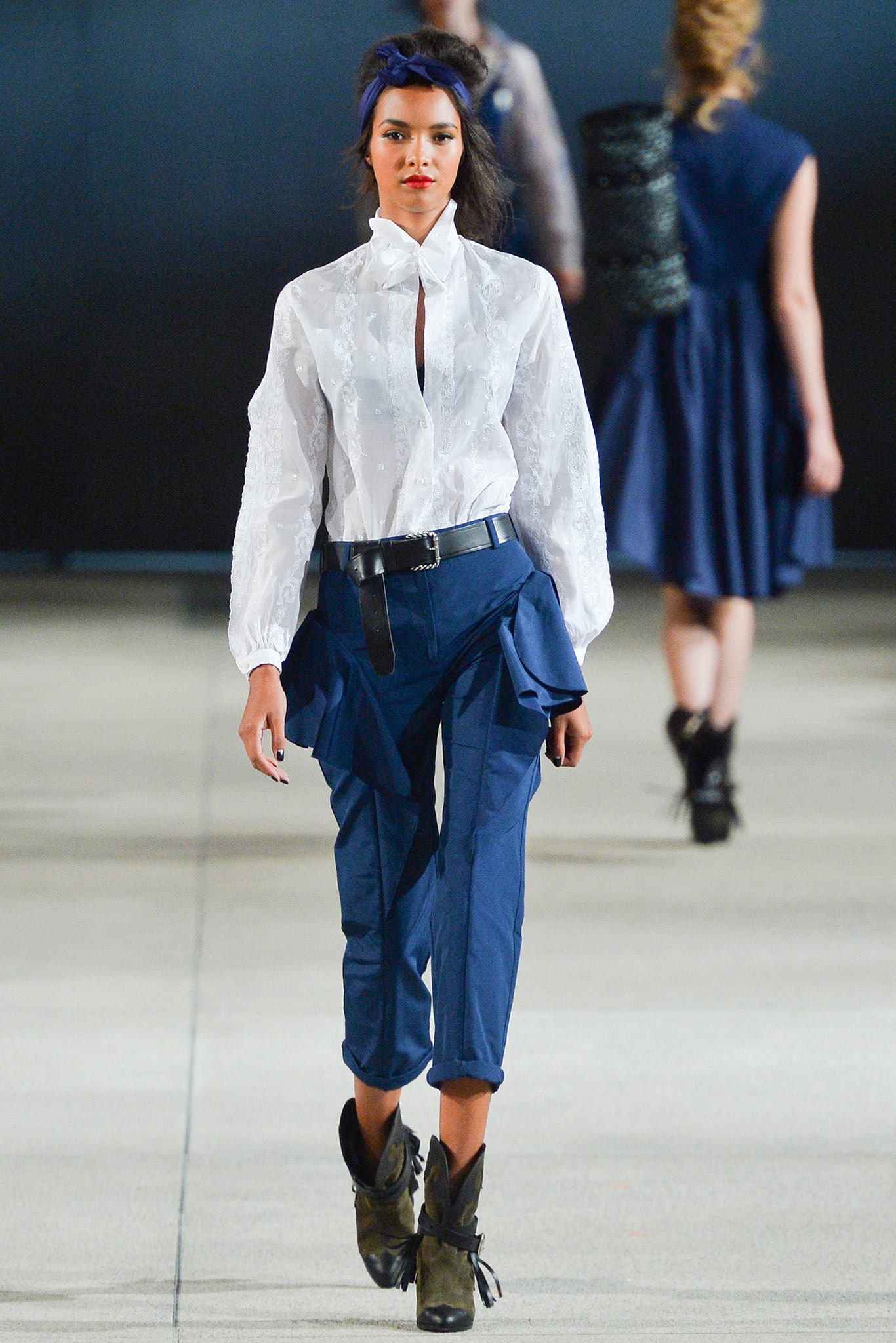 white embroidered blouse blue pants