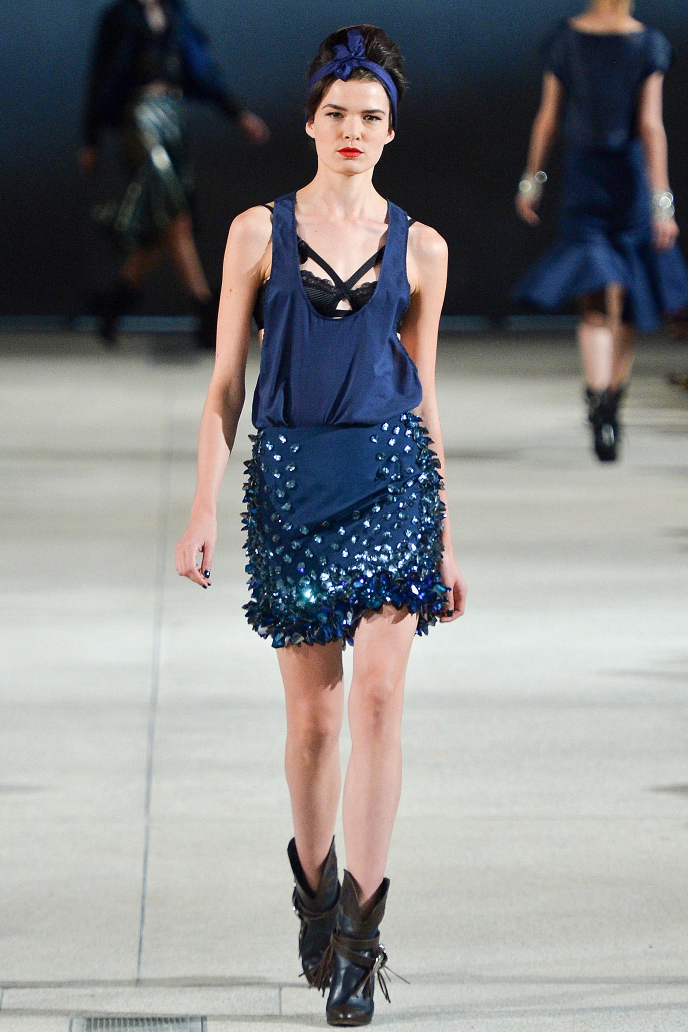 blue fitted sleeveless top and ruffled skirt