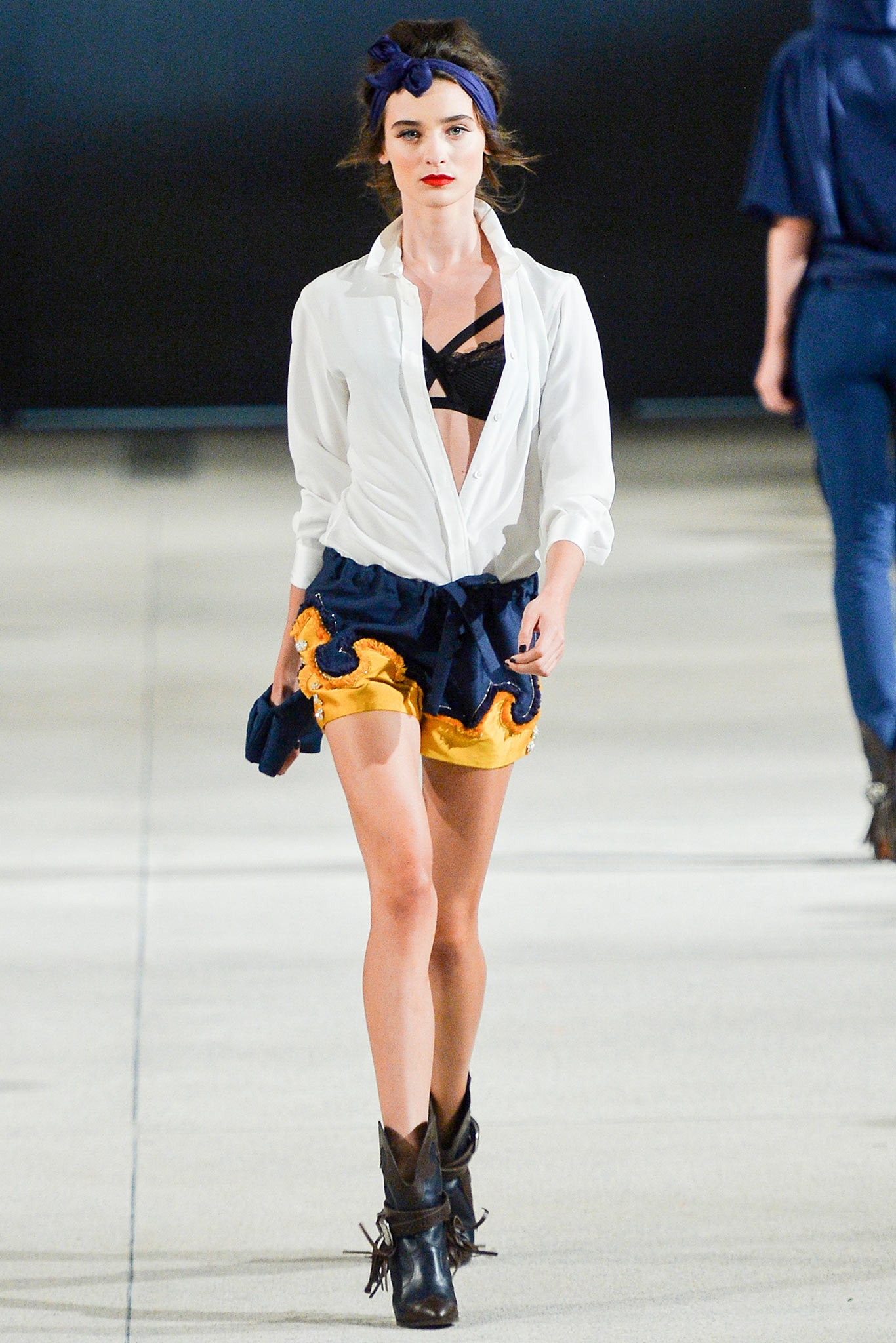 white fitted shirt with blue orange shorts