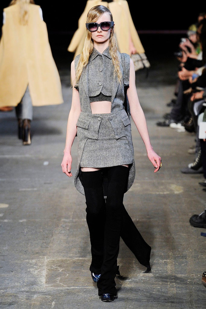 gray wool fitted vest with black pants