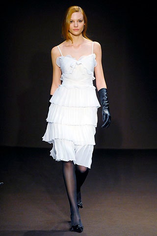 white tiered mini dress with black gloves