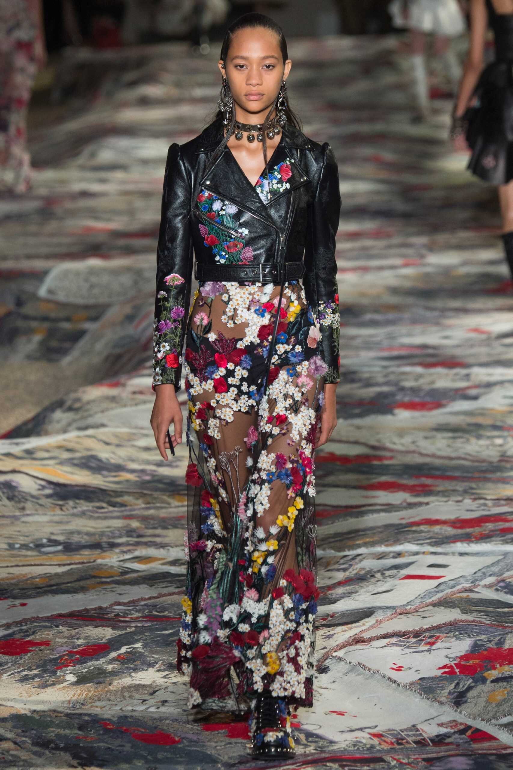 black leather embroidered jacket and multi-layered dress