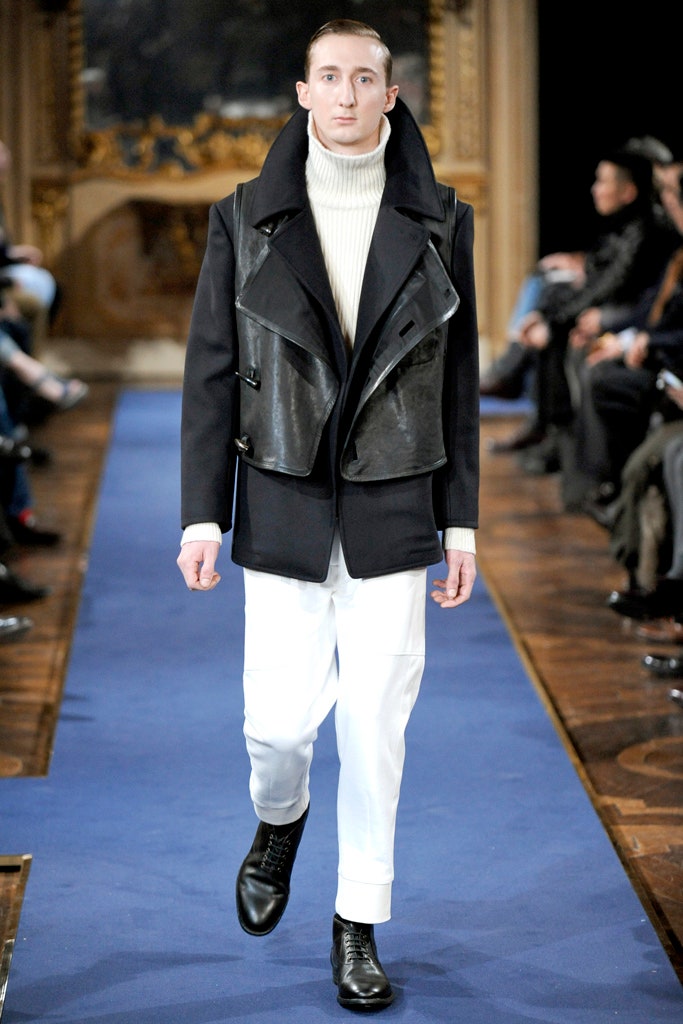 black coat white sweater tailored pants