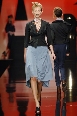 black fitted blazer and blue midi skirt